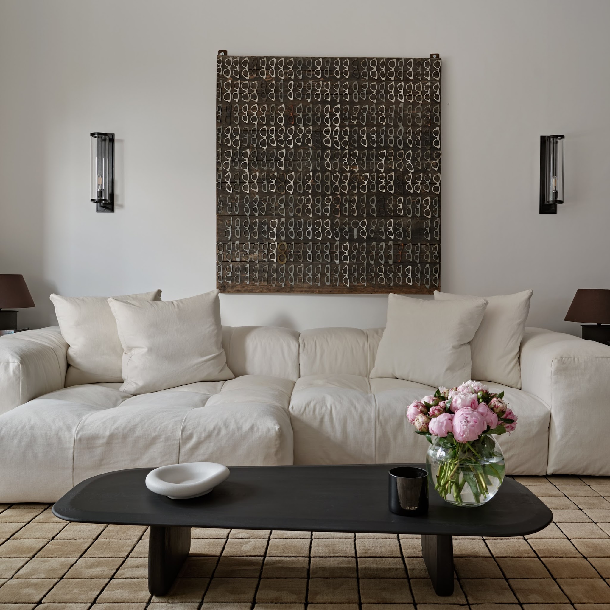 11. Sharpen a Soft White Sofa With Graphic Black Accents