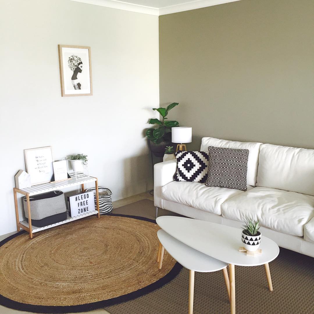 17. Add Natural Texture Beneath a White Leather Sofa