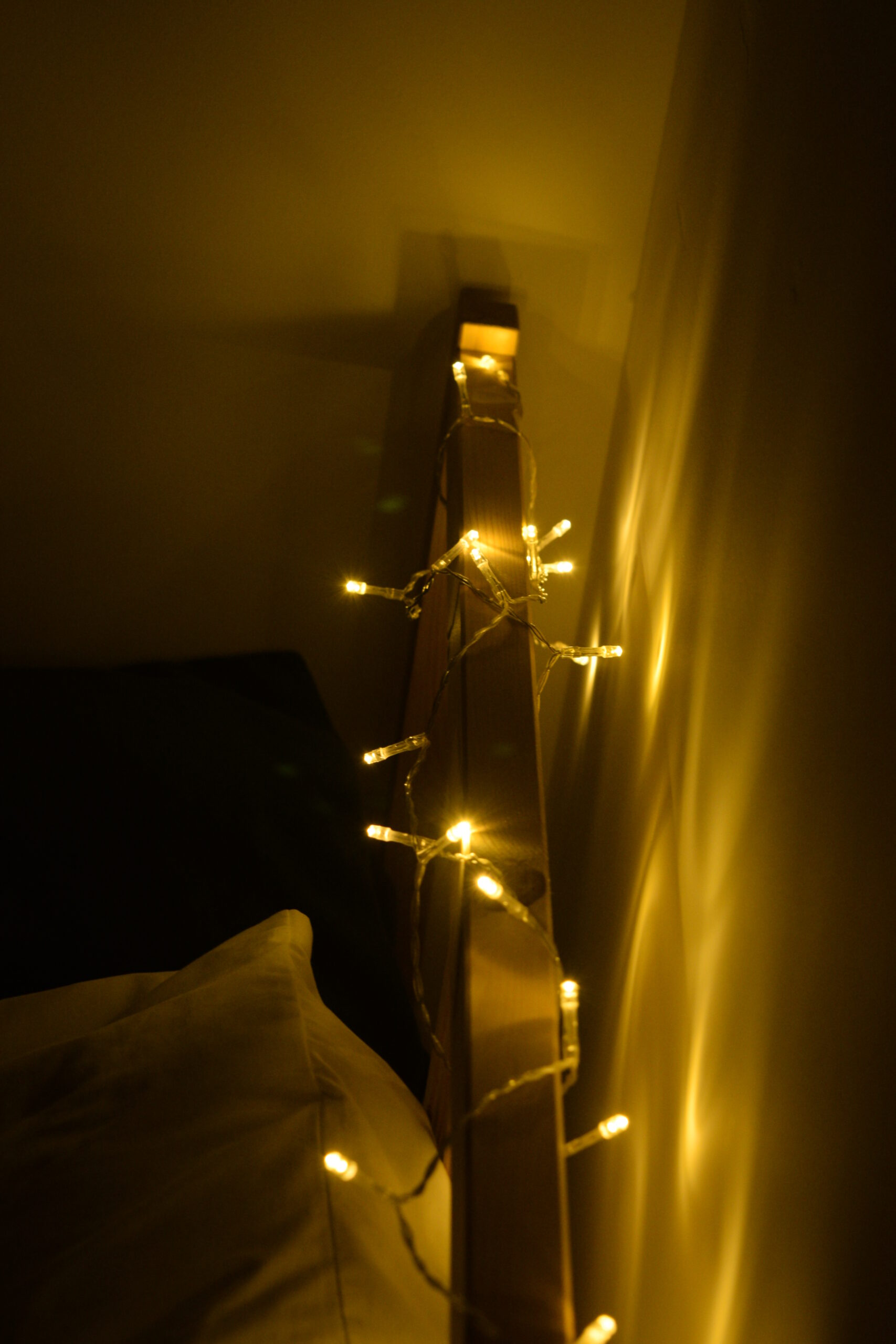 14. Add a Light Strand to an Open Headboard