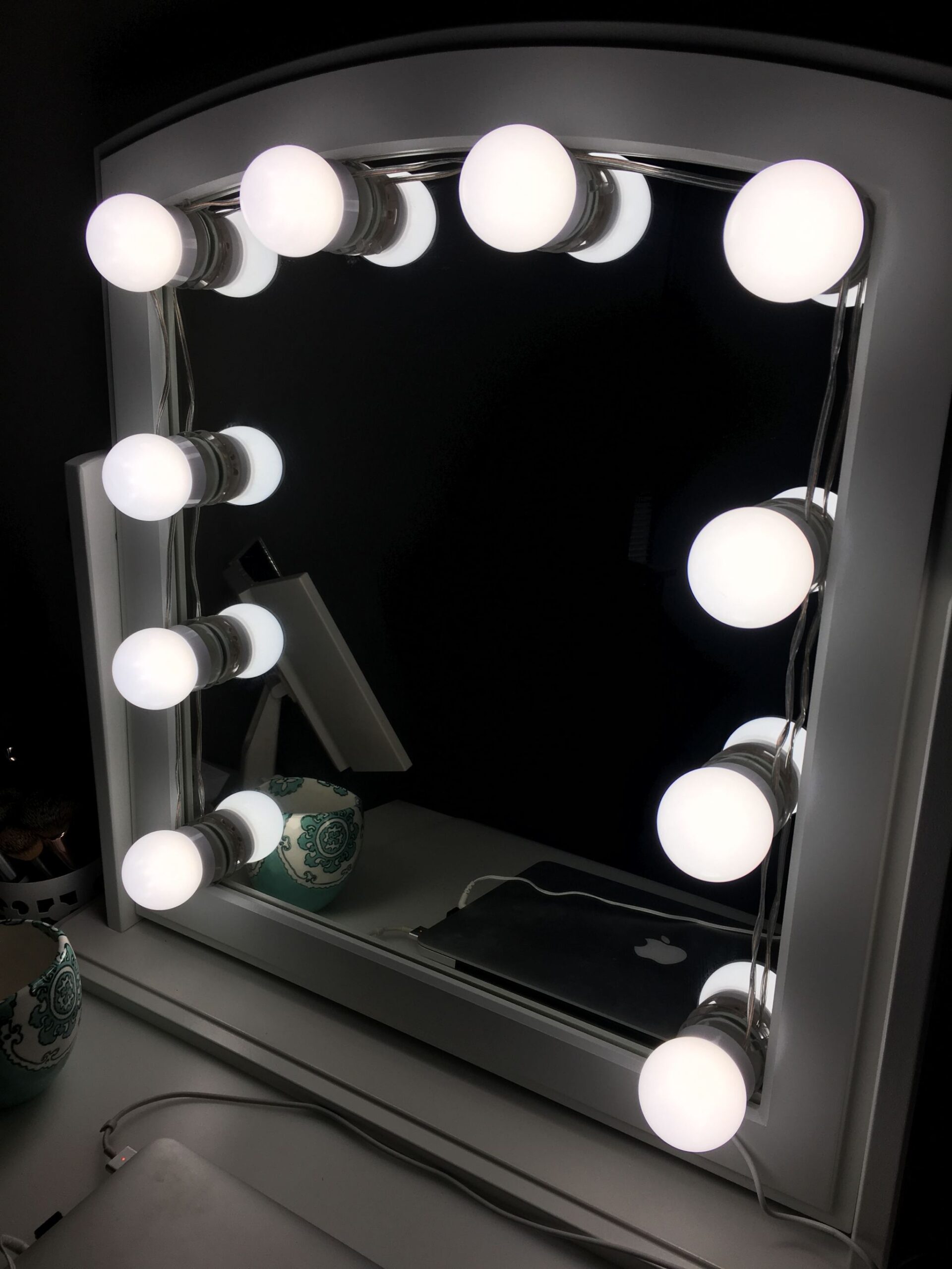 17. Frame a Bedroom Vanity With LED Bulbs
