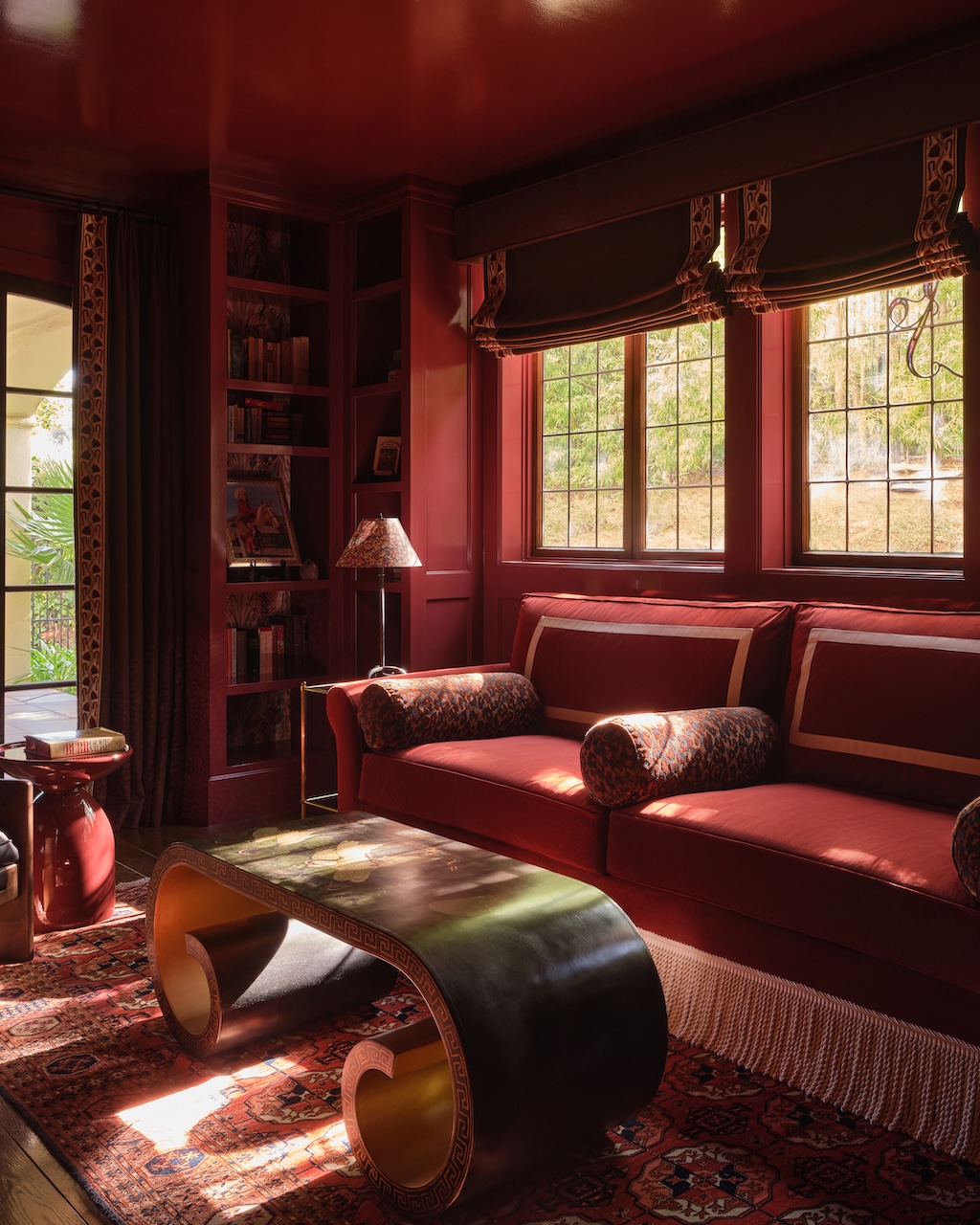 13. Carry a Rich Wall Color Across the Shelves