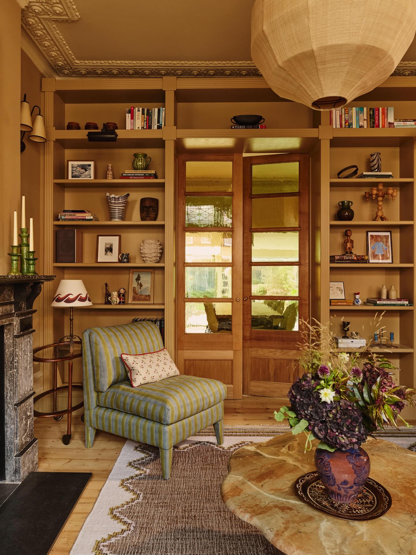 19. Wrap Bookshelves Around a Glazed Doorway