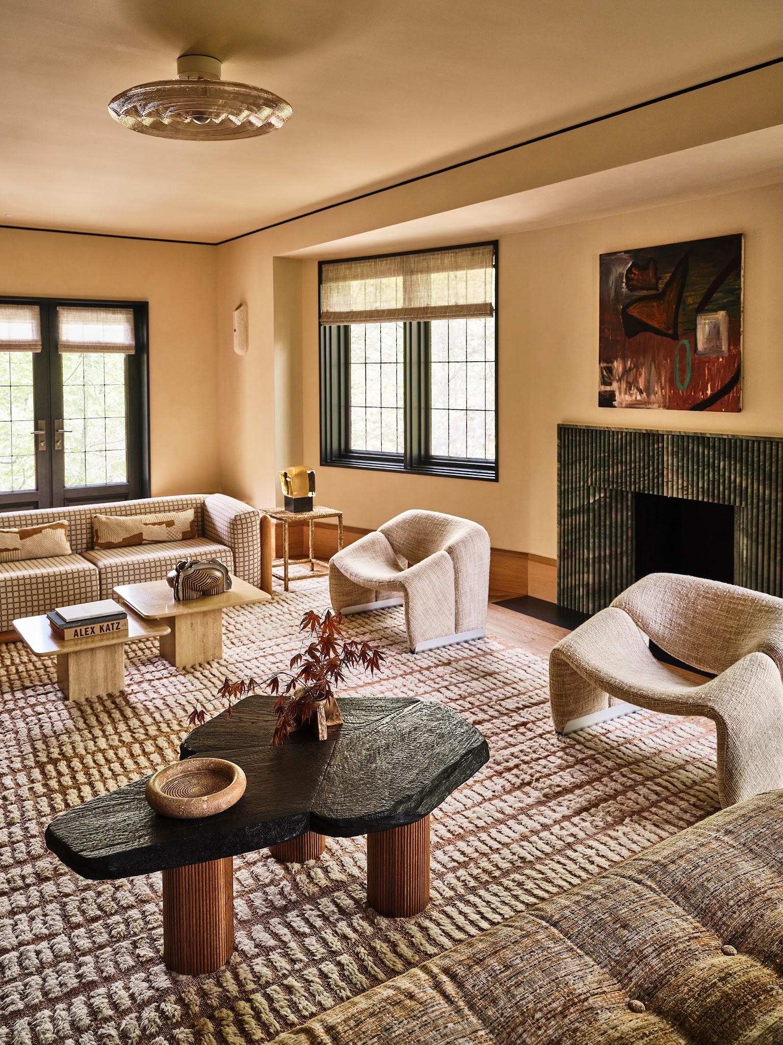 2. Warm Peach Walls with Cream and Nearly Black Accents