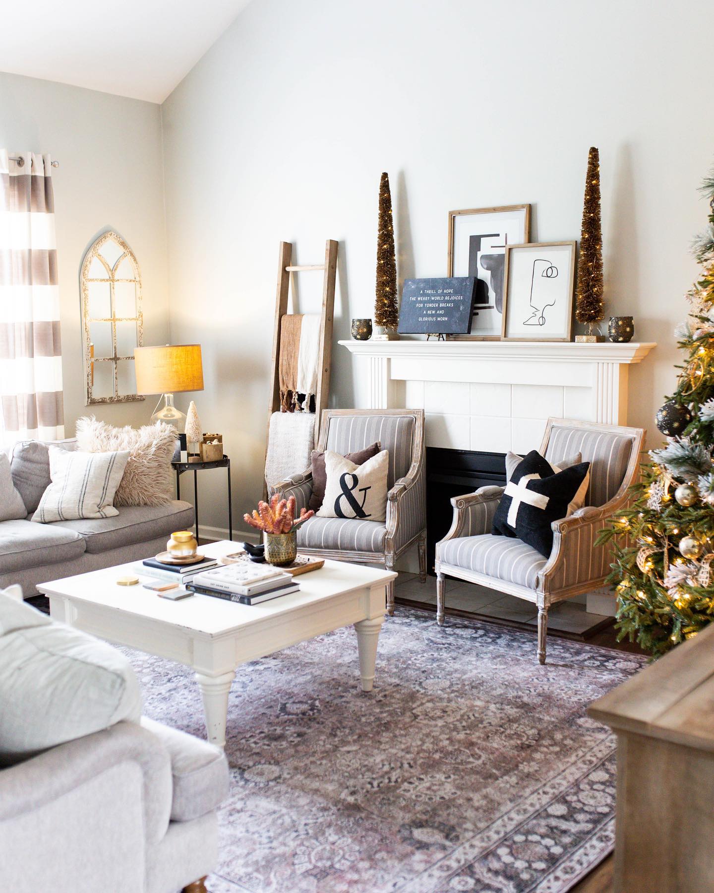 17. Frame Mantel Artwork With Tall Decorative Trees