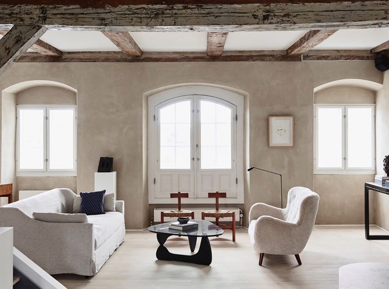 2. Mix Sculptural Seats Beneath Exposed Beams