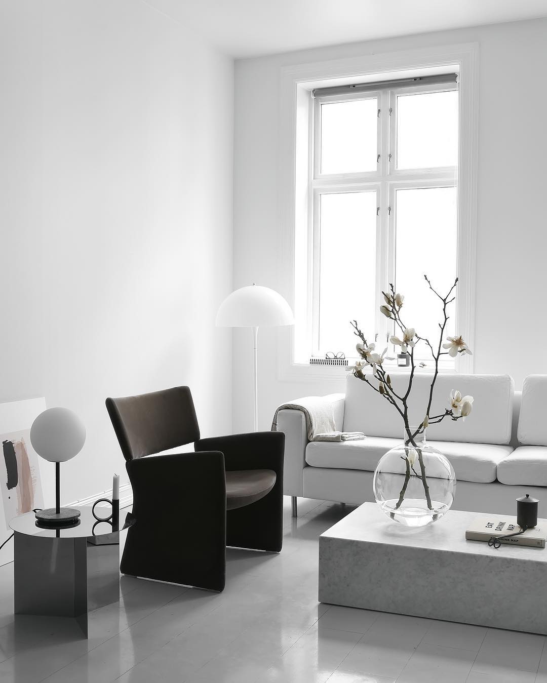 8. Give a White Room Shape With One Dark Chair