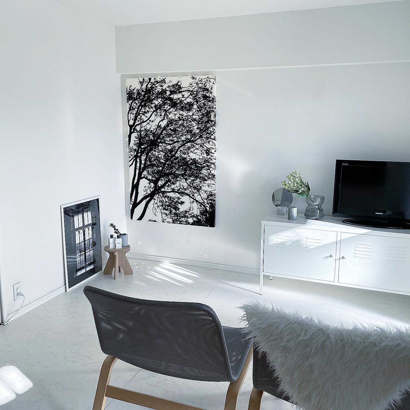 3. Keep a Small TV Room Light With Two Chairs