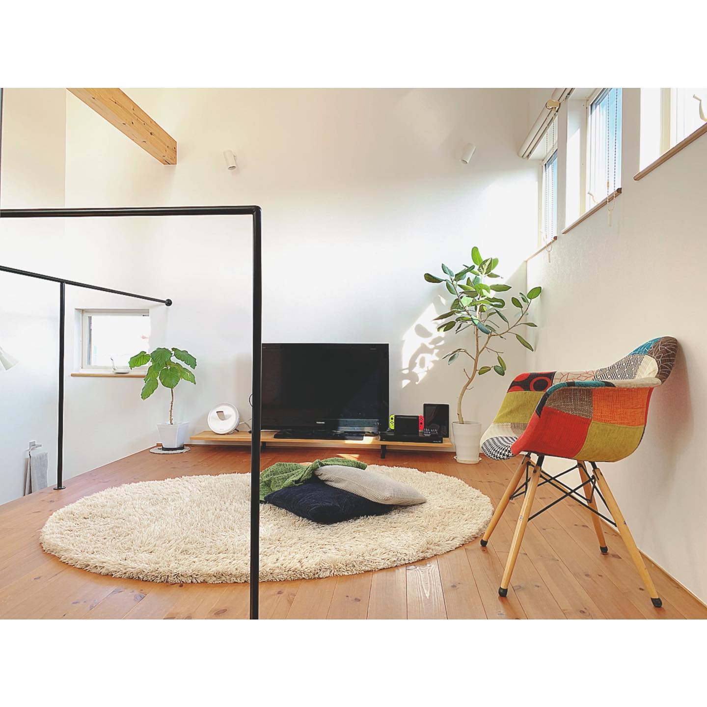 8. Mix Floor Cushions With One Colorful Accent Chair