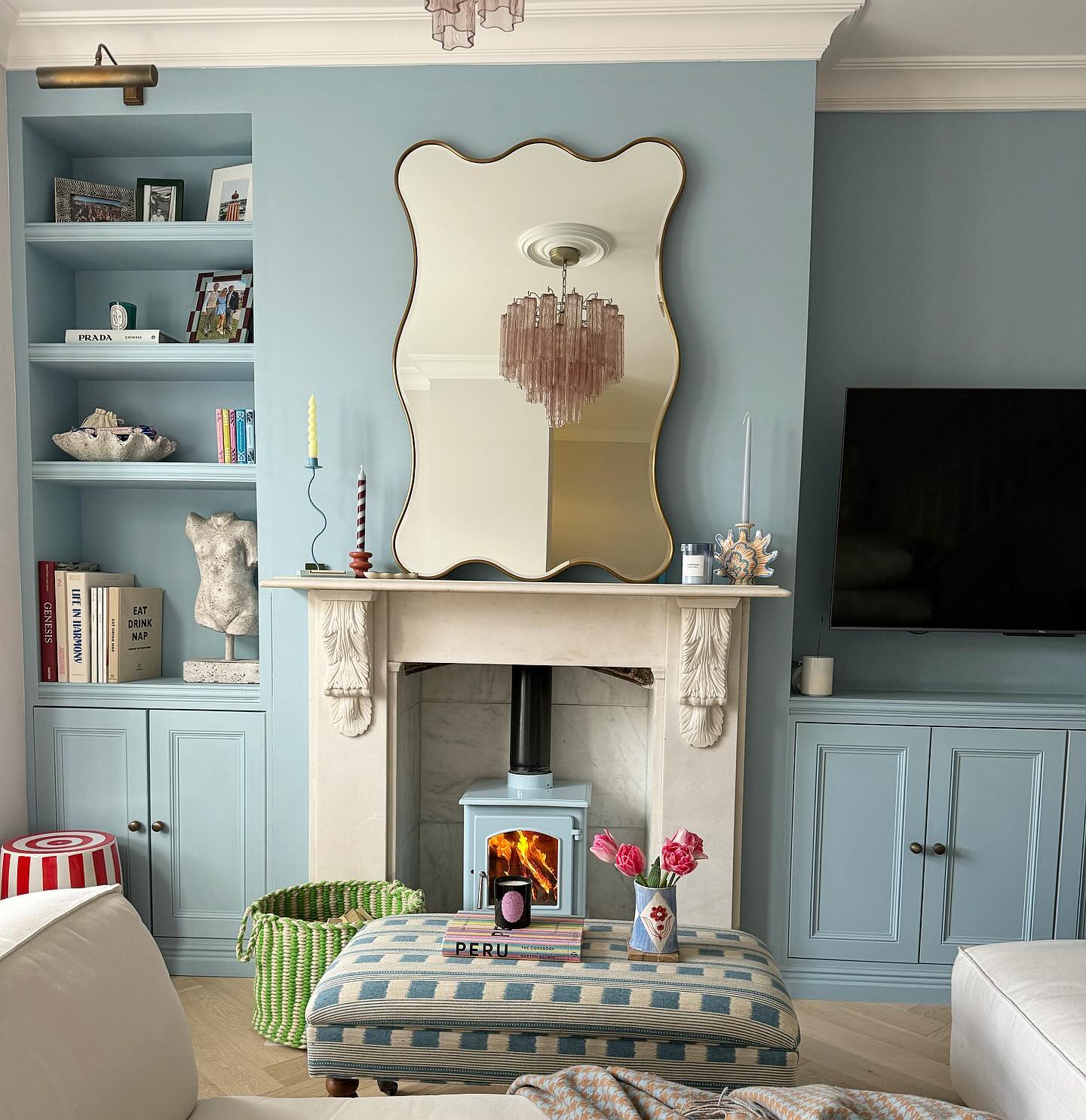 11. Make a Wavy Mirror the Mantel Centerpiece
