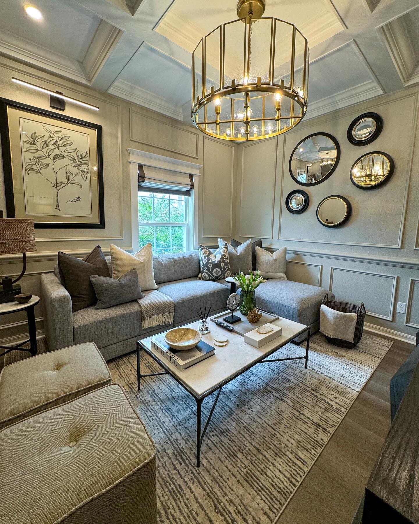 20. Group Round Mirrors Within a Paneled Wall