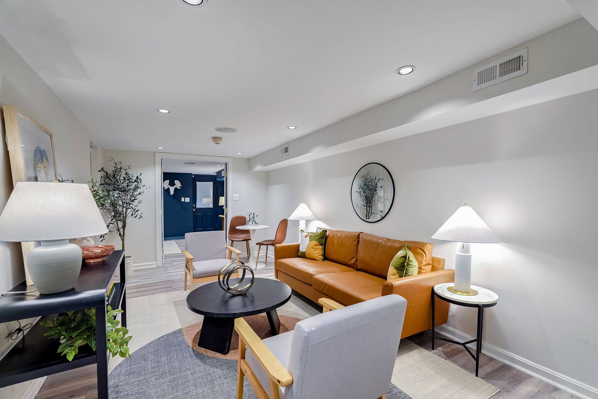 12. Spread Table Lamps Along a Long Basement Lounge
