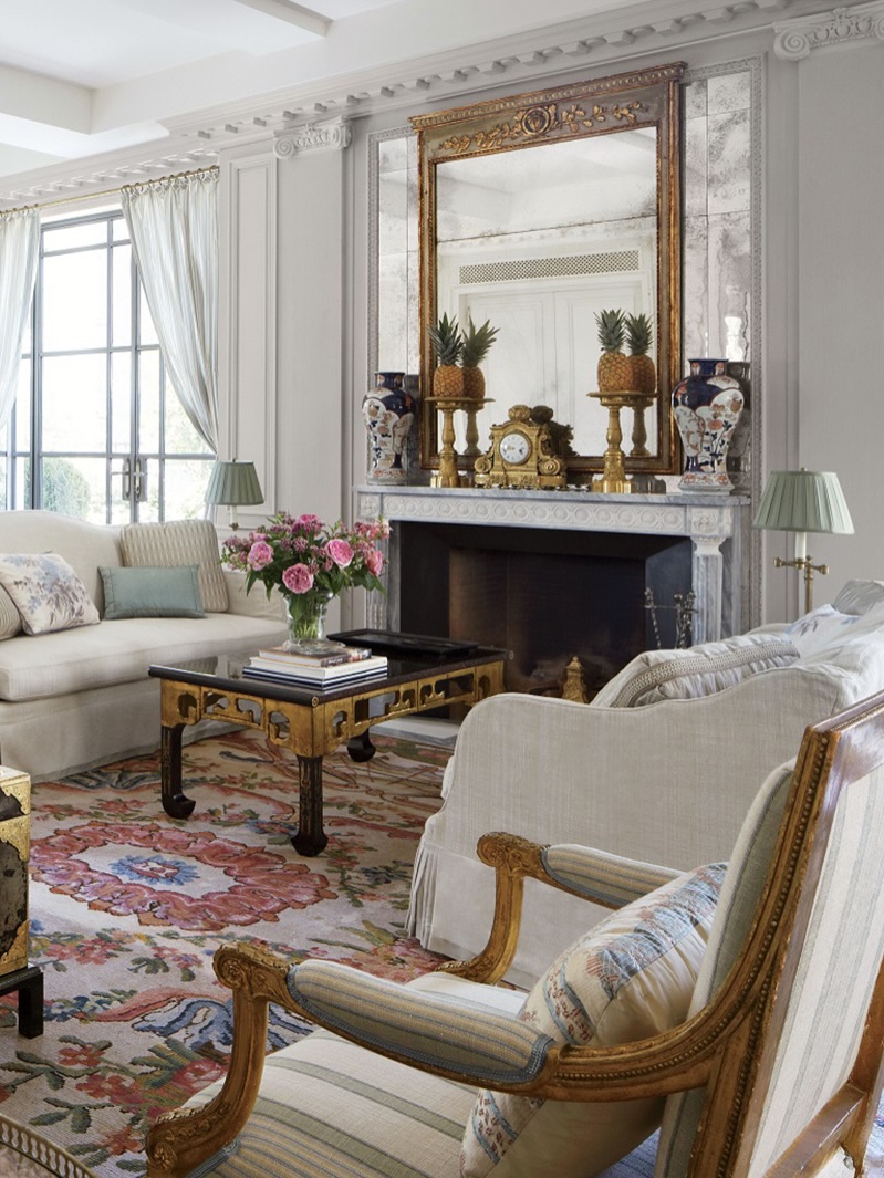 5. Frame the Fireplace With Reflective Detail