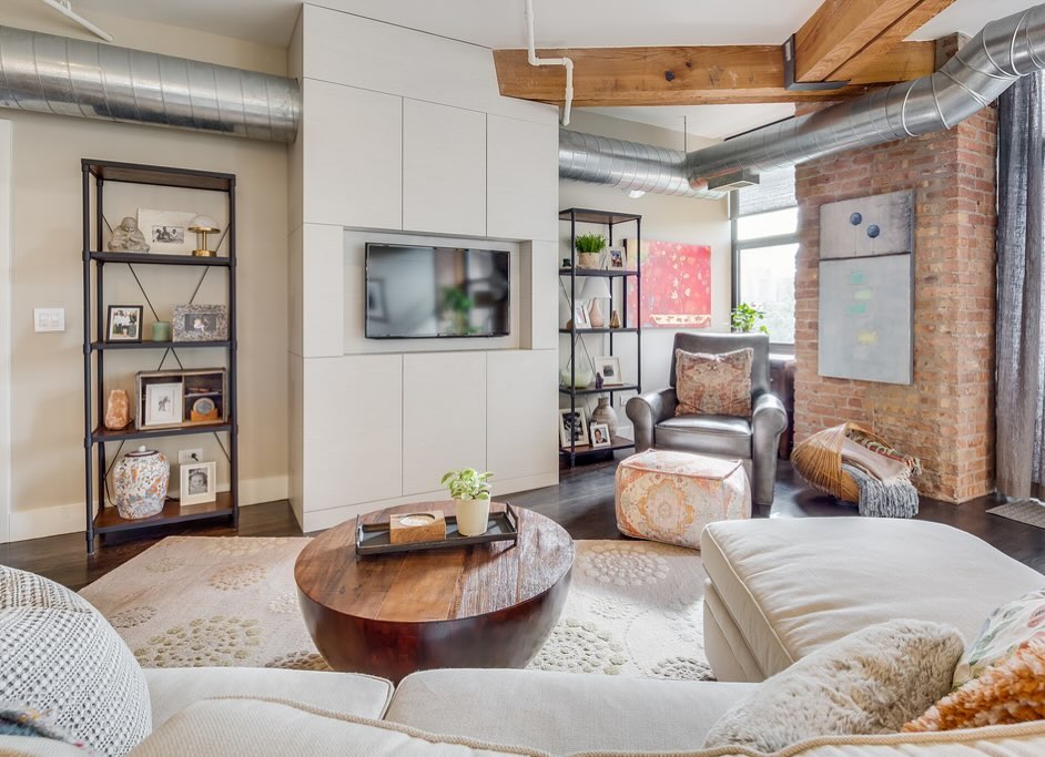 11. Soften Exposed Brick With a Pale Media Wall