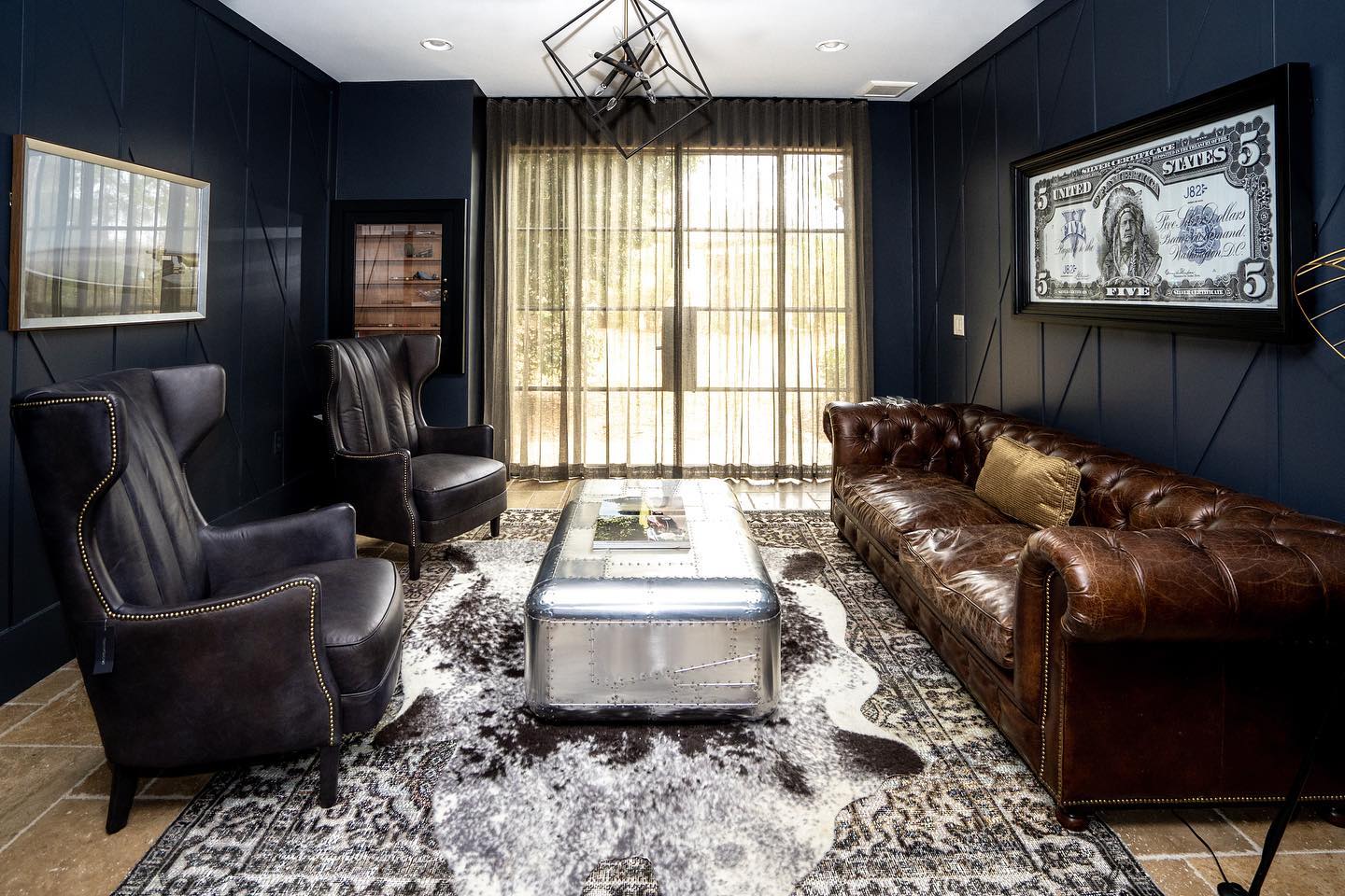 20. Add Geometric Paneling Behind Traditional Leather Seating