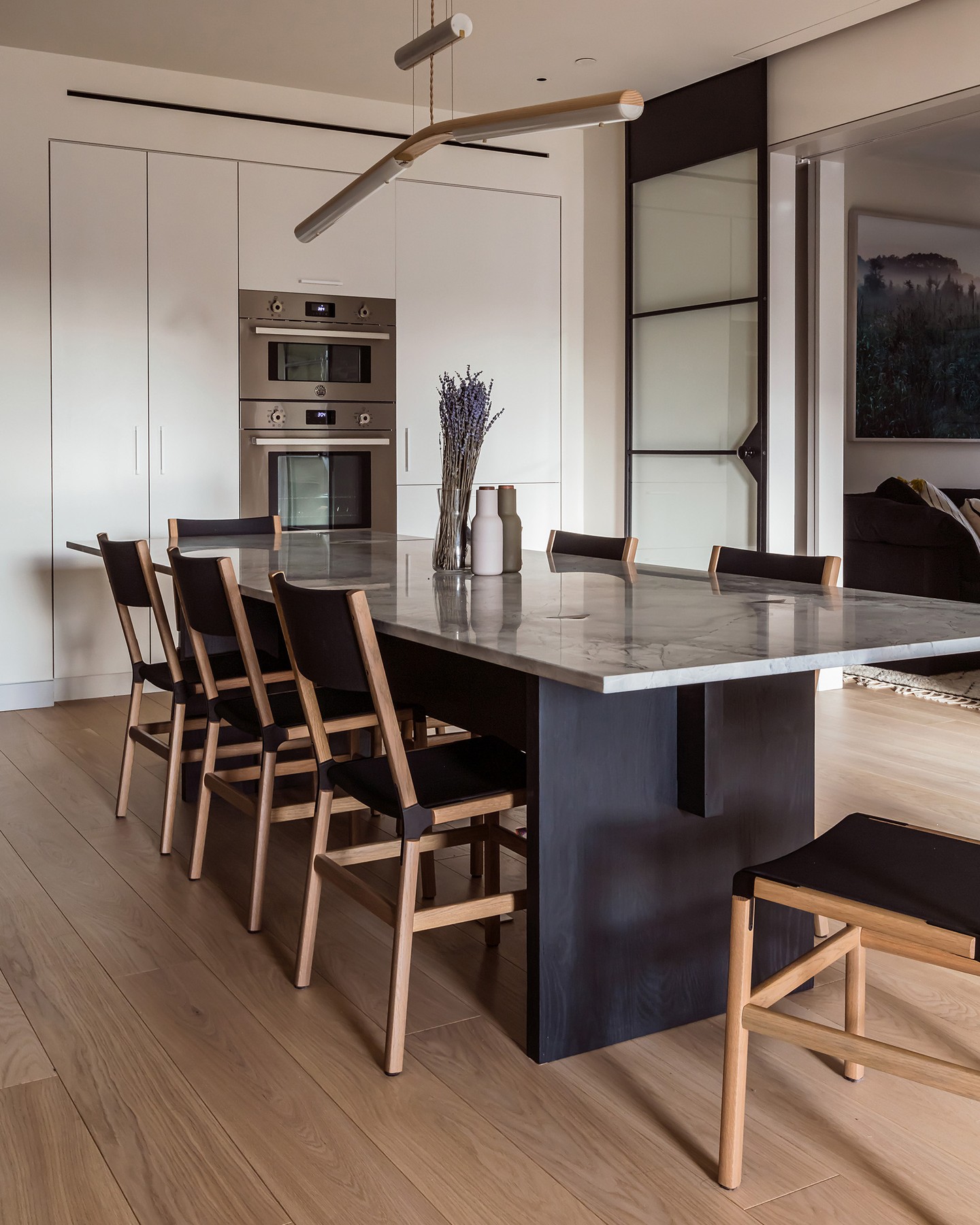 3. Pair a Stone Table with Light Wood Chairs