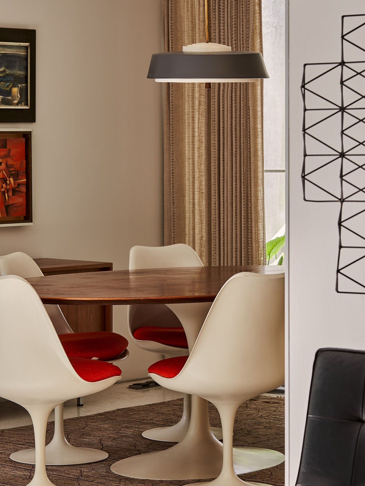 11. Keep a Tulip Dining Set Visually Light