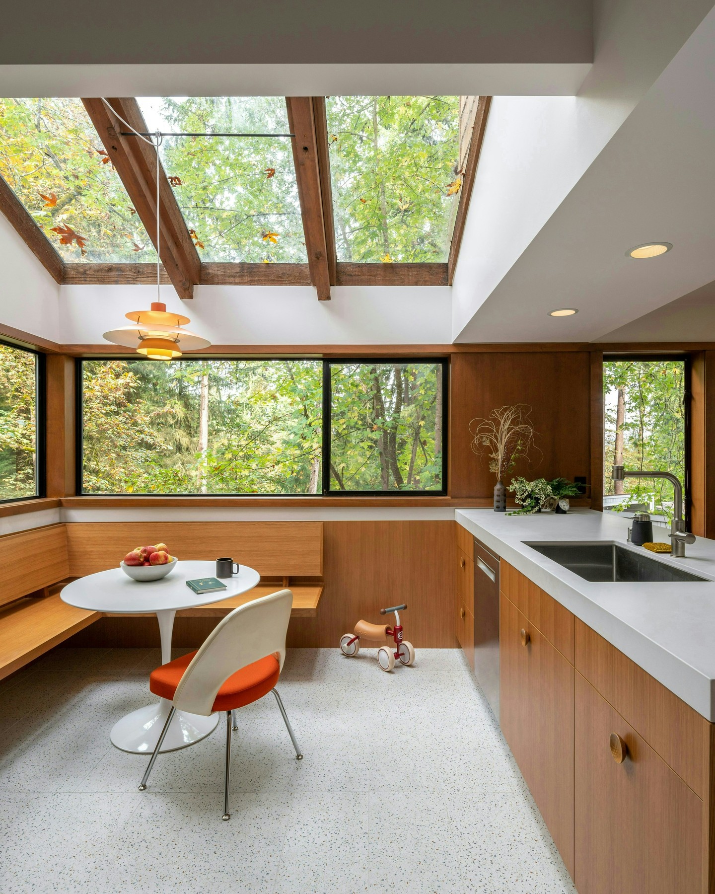12. Use a Pedestal Table Beneath a Glass Roof
