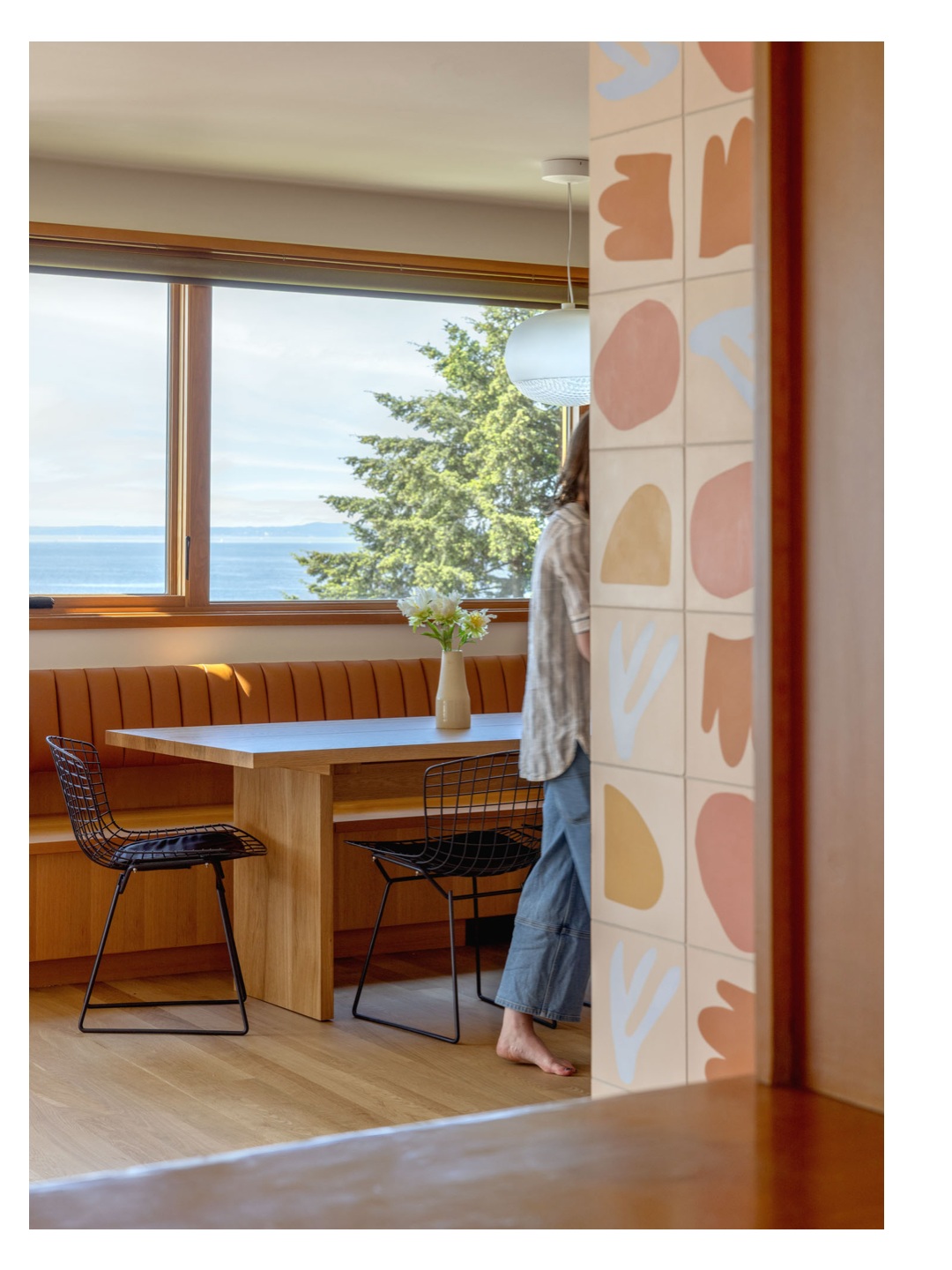 15. Pair Wire Chairs with a Cushioned Window Bench