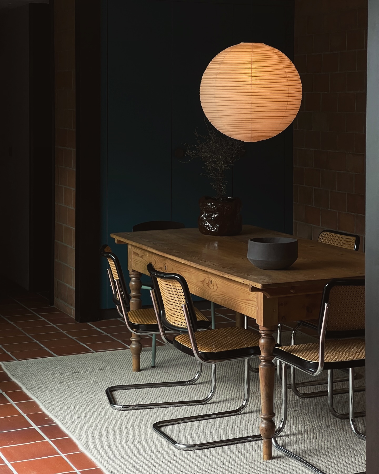 16. Mix Cantilever Chairs with a Rustic Wood Table