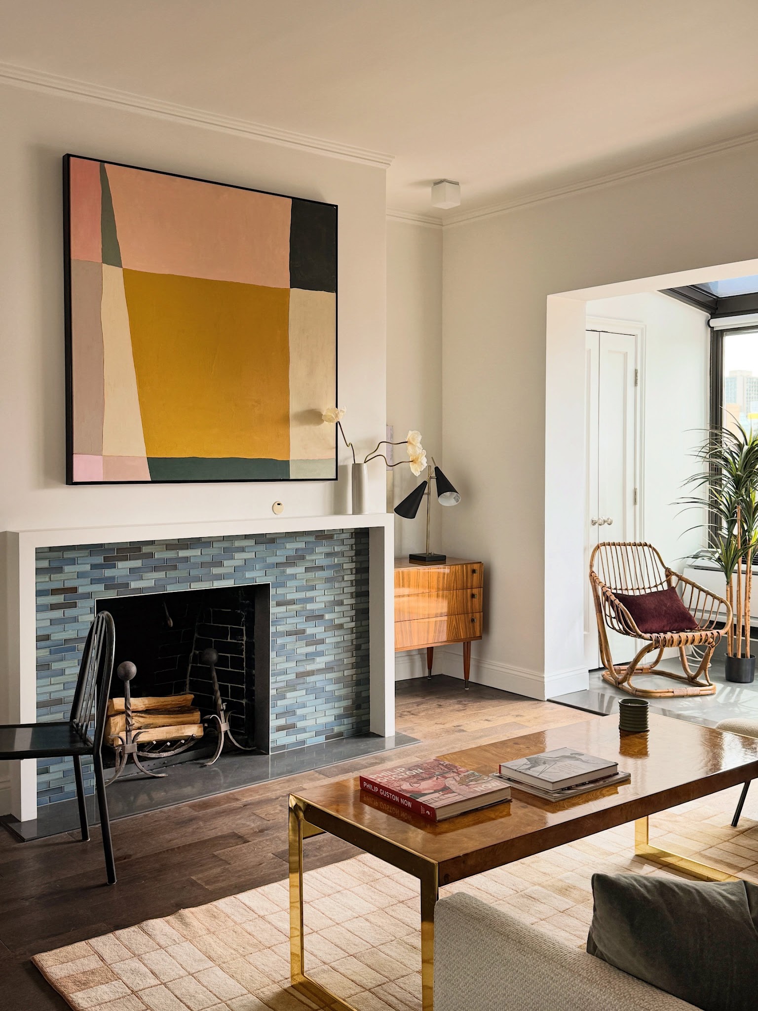 7. Pair Cool Fireplace Tile With Warm Abstract Art