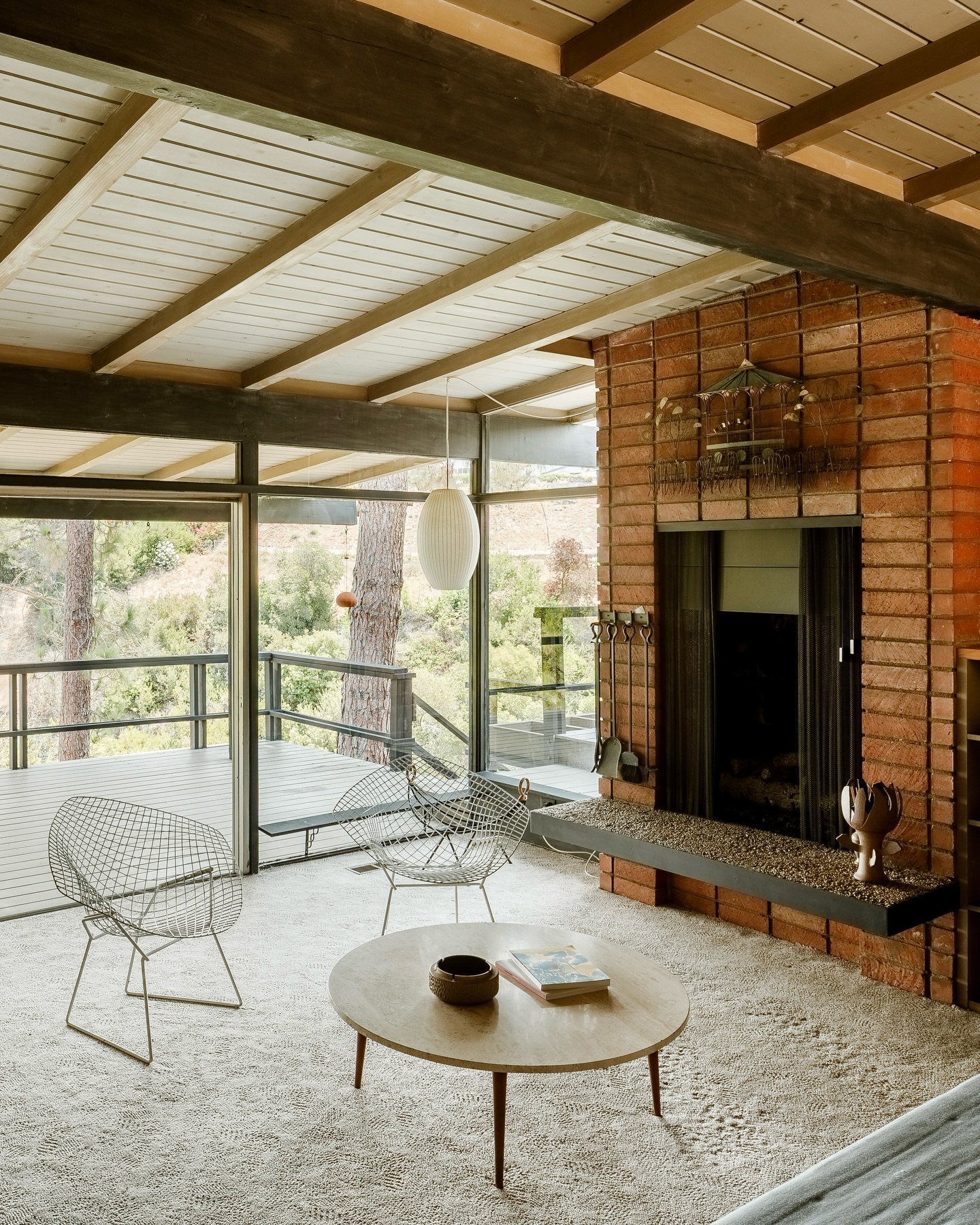 7. Pair Red Brick with Airy Wire Chairs