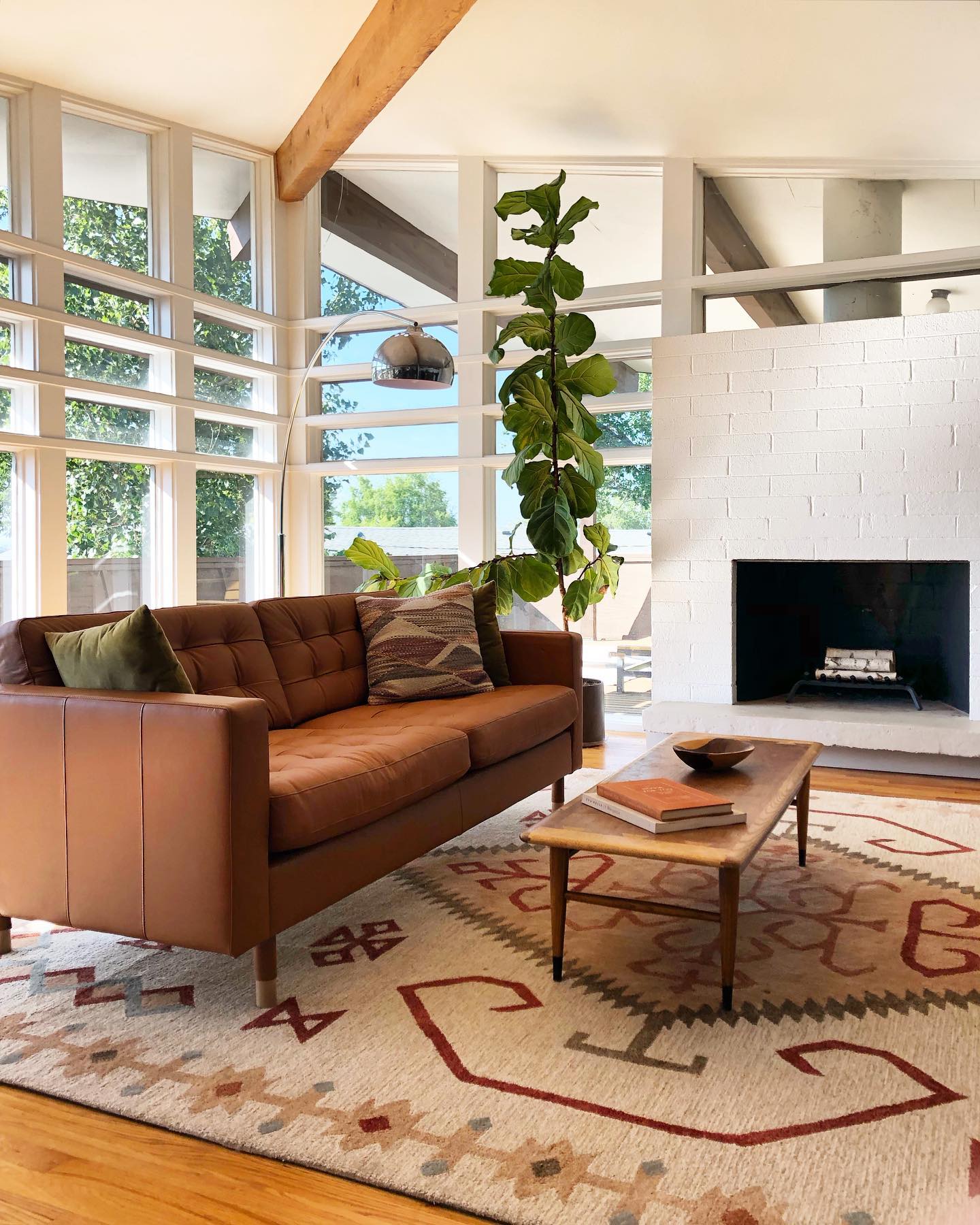 13. Warm a White Brick Fireplace with Cognac