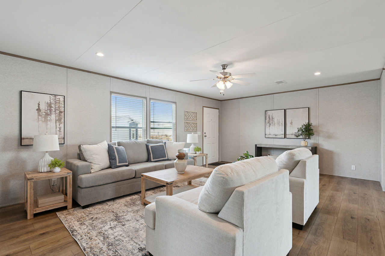 5. Balance a Gray Sofa With White Chairs