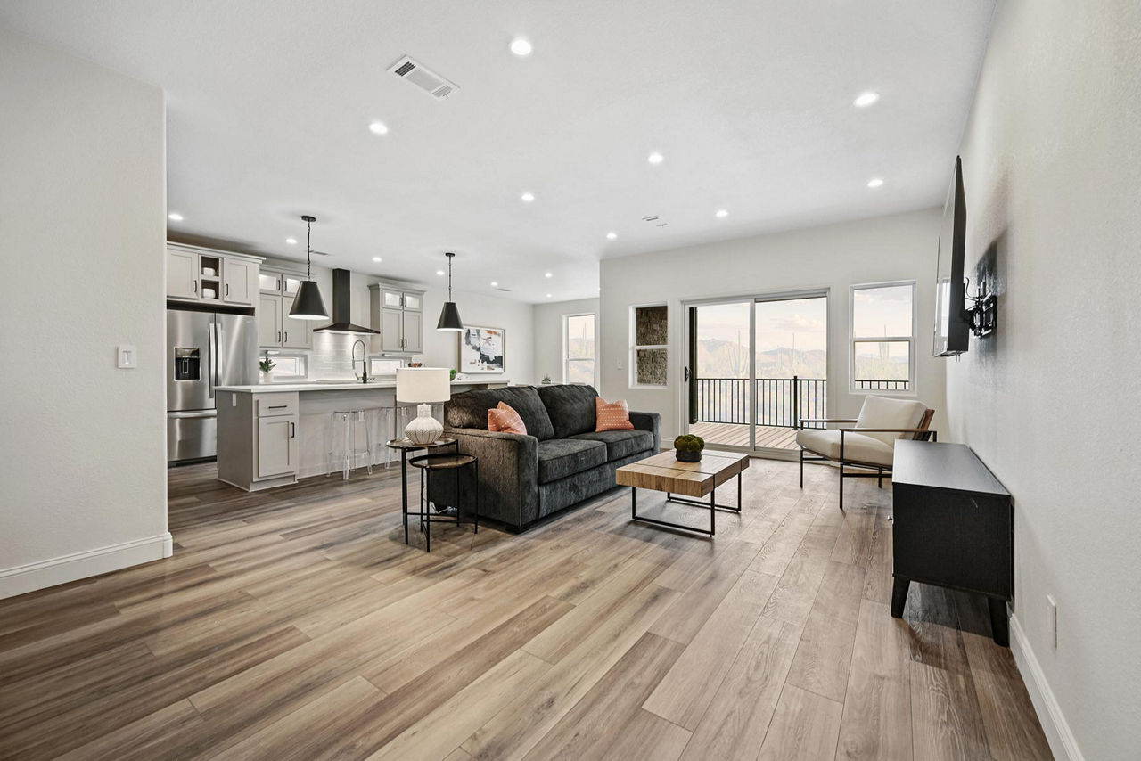 18. Float Dark Seating Within a Bright Open Plan