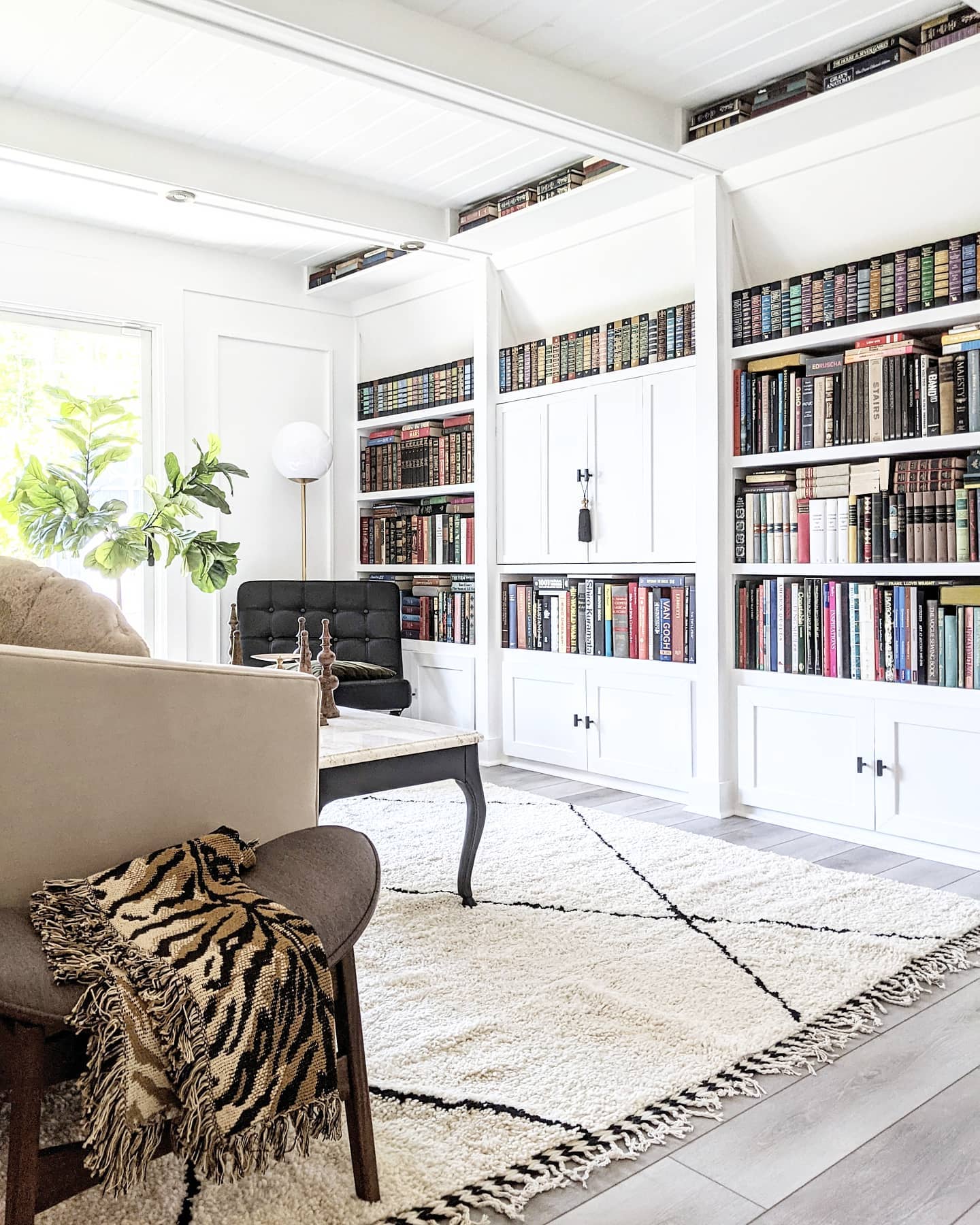 13. Soften Clean Cabinetry With a Generous Shaggy Rug