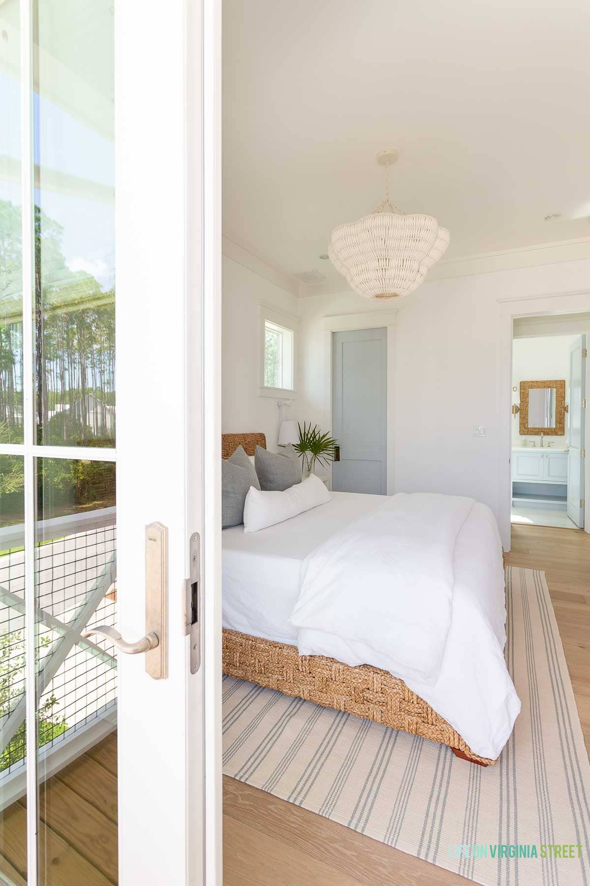20. Repeat Fine Blue Stripes Beneath White Bedding