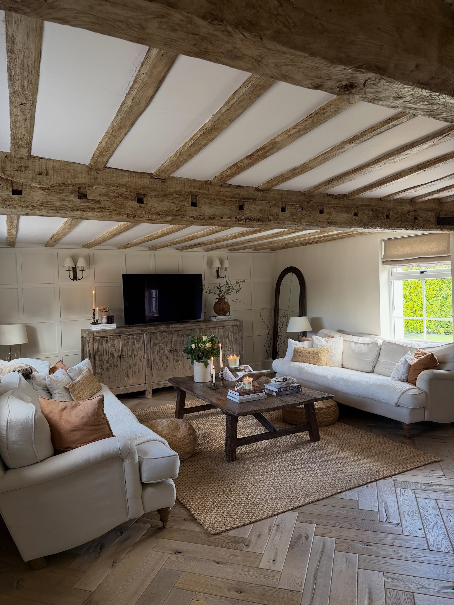14. Choose Pale Seating for a Heavily Beamed Room
