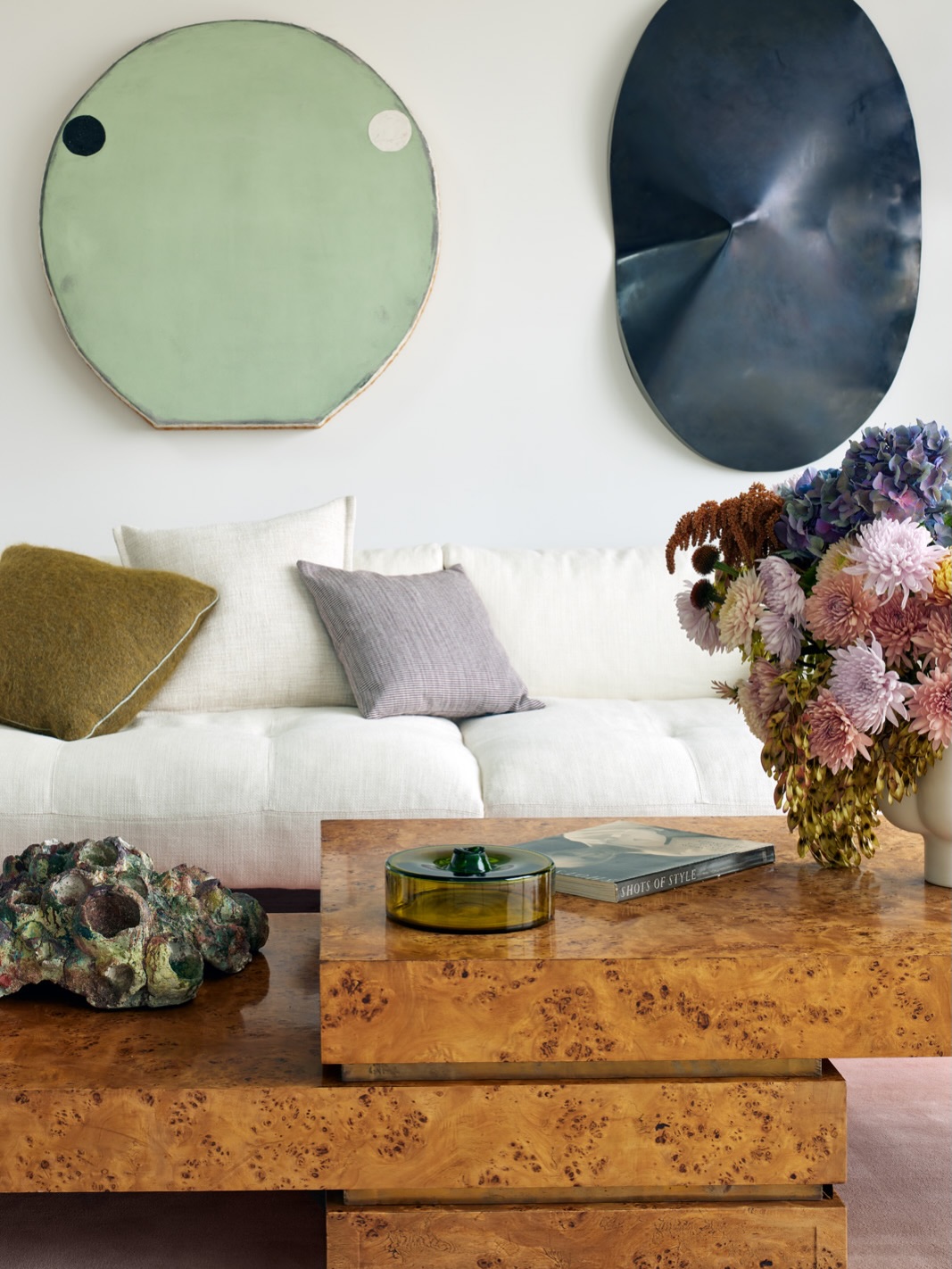 10. Use Sculptural Art to Animate a Pale Sofa