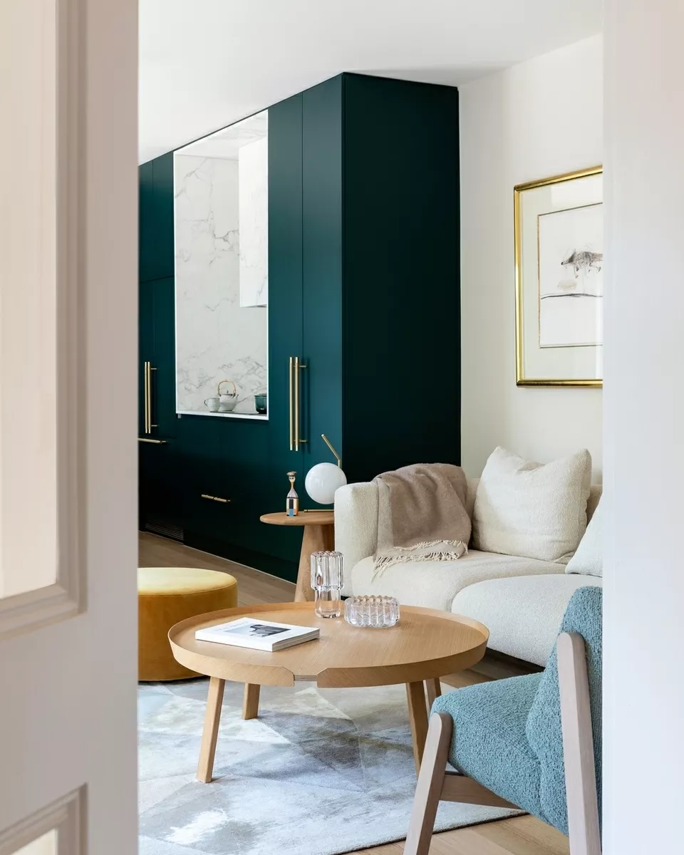 19. Give Compact Seating a Deep Colored Backdrop