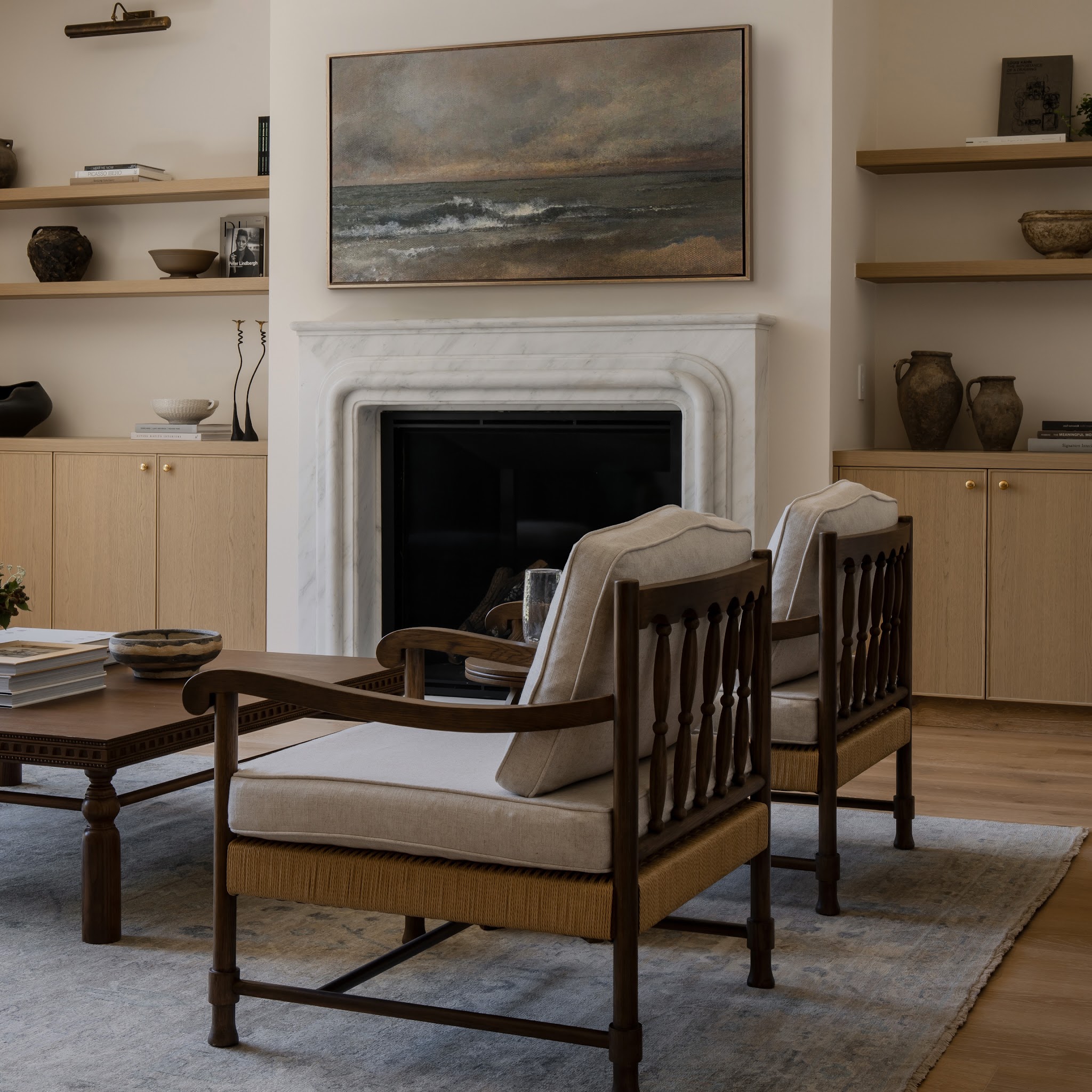 3. Mix Pale Cabinetry with Dark Wood Chairs