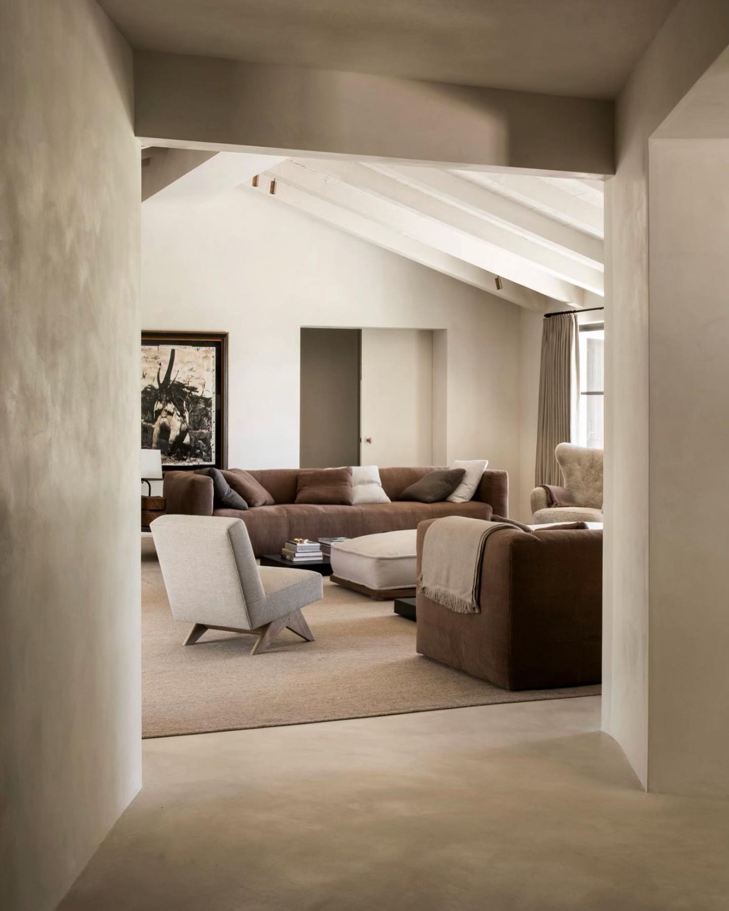 4. Frame a Tonal Lounge with Textured Walls