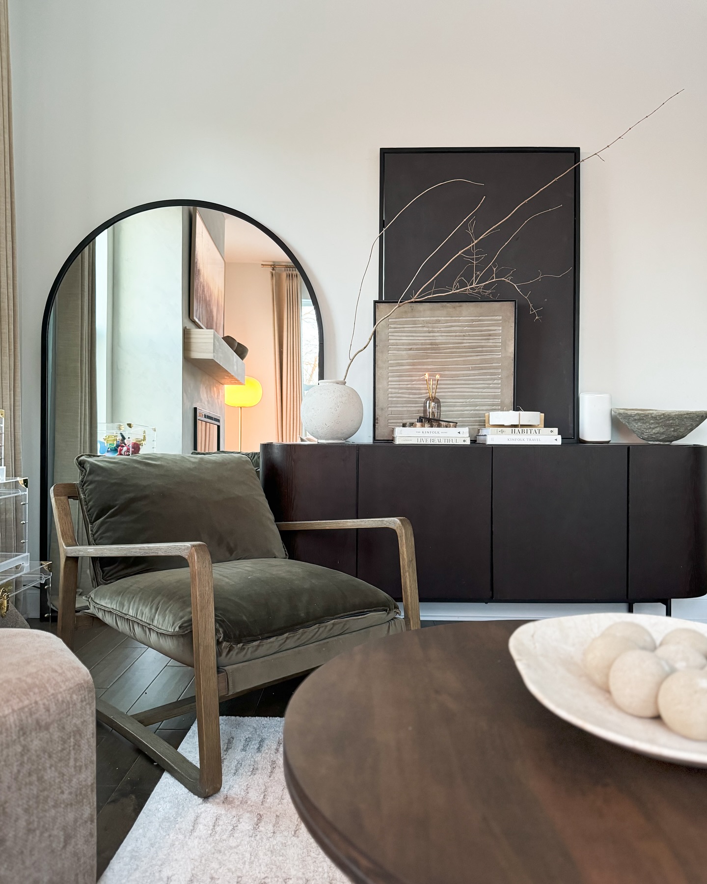 6. Ground an Olive Chair with a Dark Console