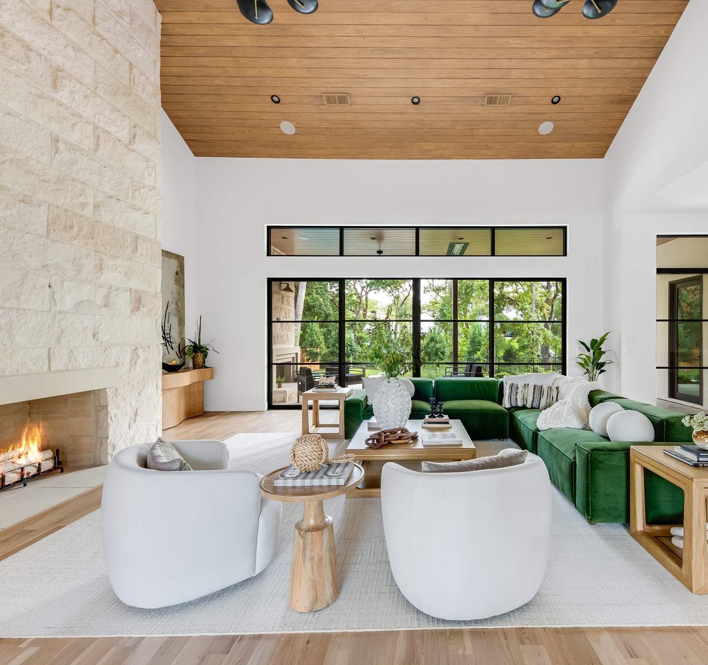 9. Echo Outdoor Greenery with a Deep Green Sofa