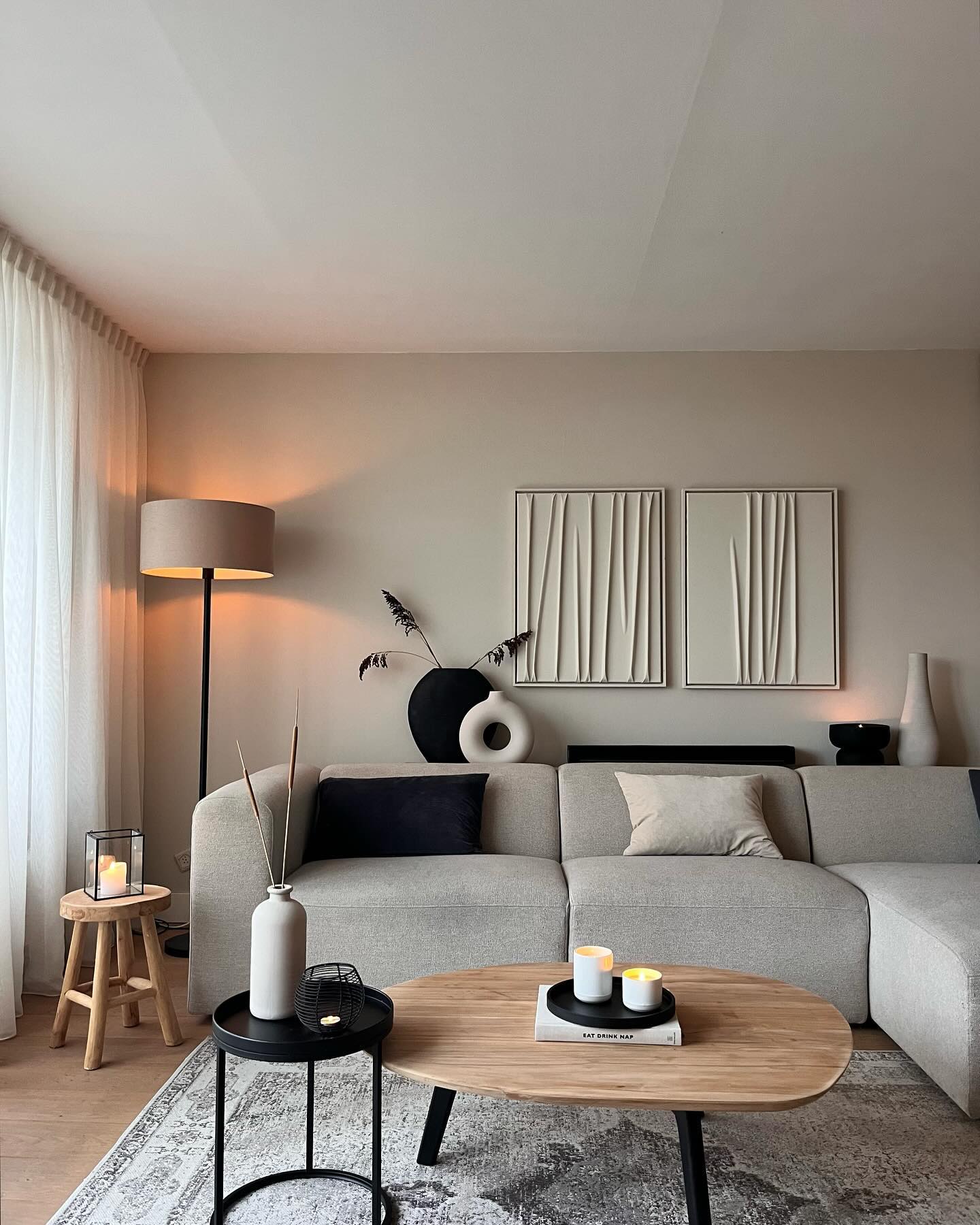 18. Let Relief Art Add Texture Above the Sofa