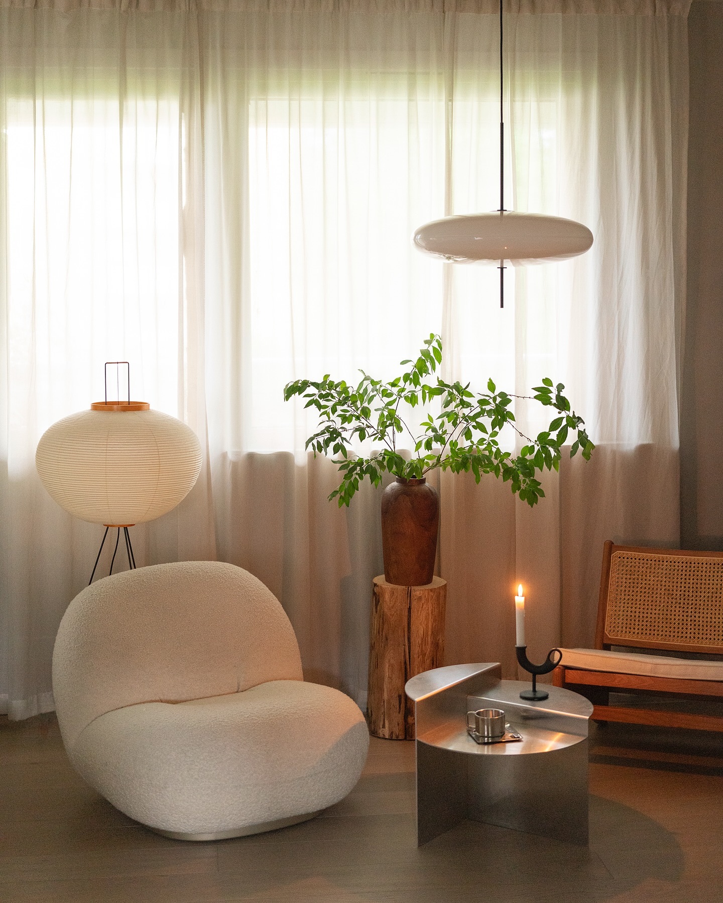 20. Pair a Rustic Wood Pedestal with Polished Metal