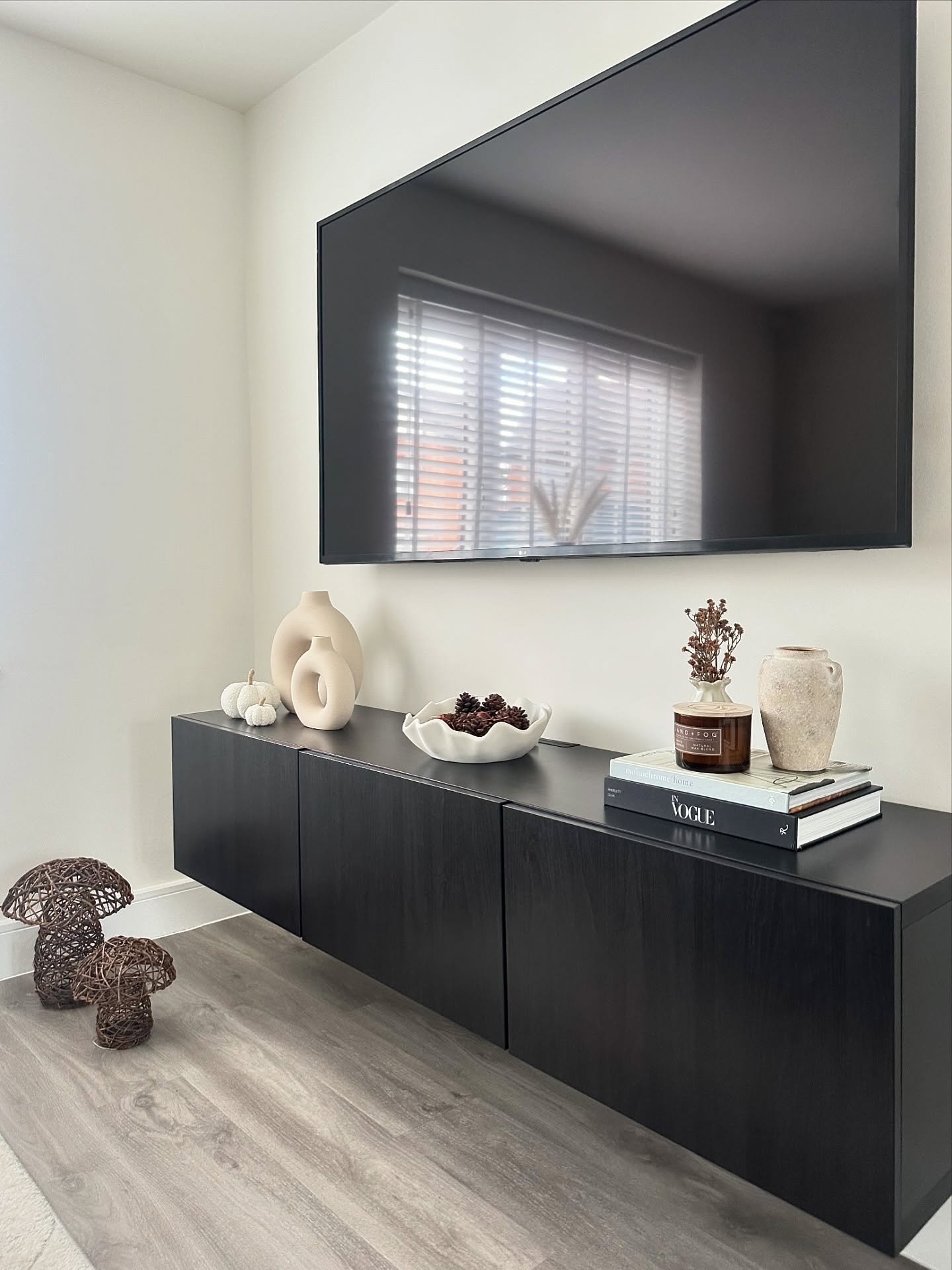 7. Pair a Plain Wall With a Floating Black Console