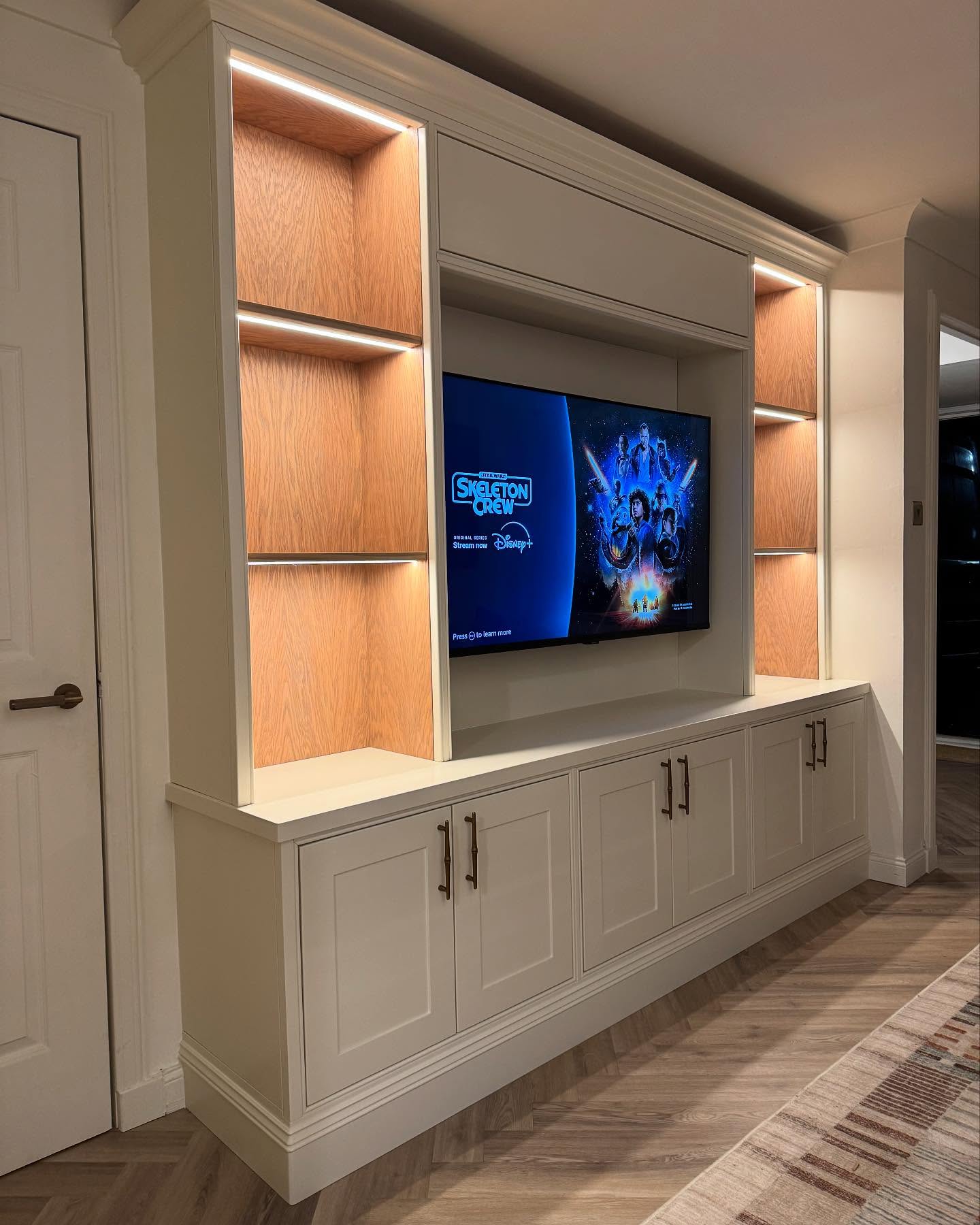 16. Warm White Cabinetry With Wood Shelf Backs