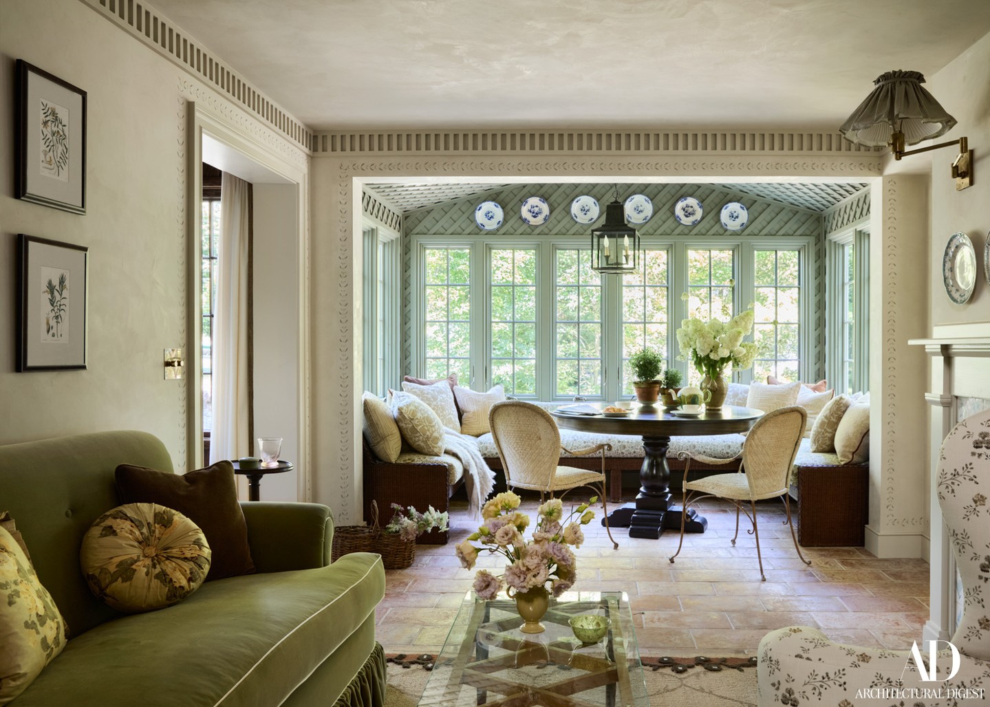 3. Pair a Fringed Sofa With a Clear Coffee Table