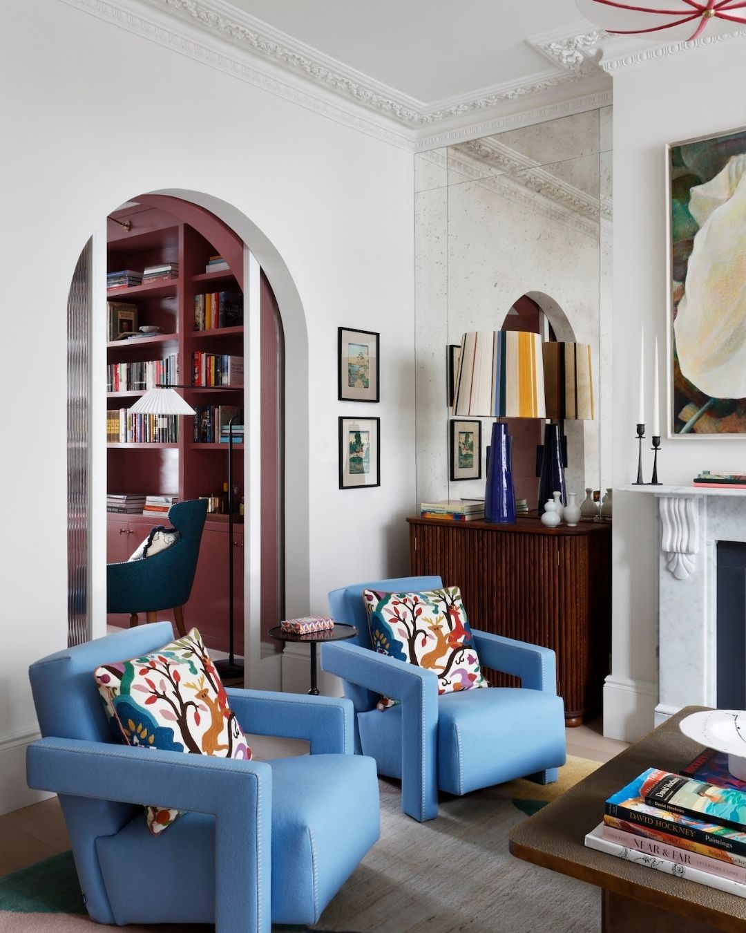 7. Bring Bright Geometric Chairs Into a Classic Room