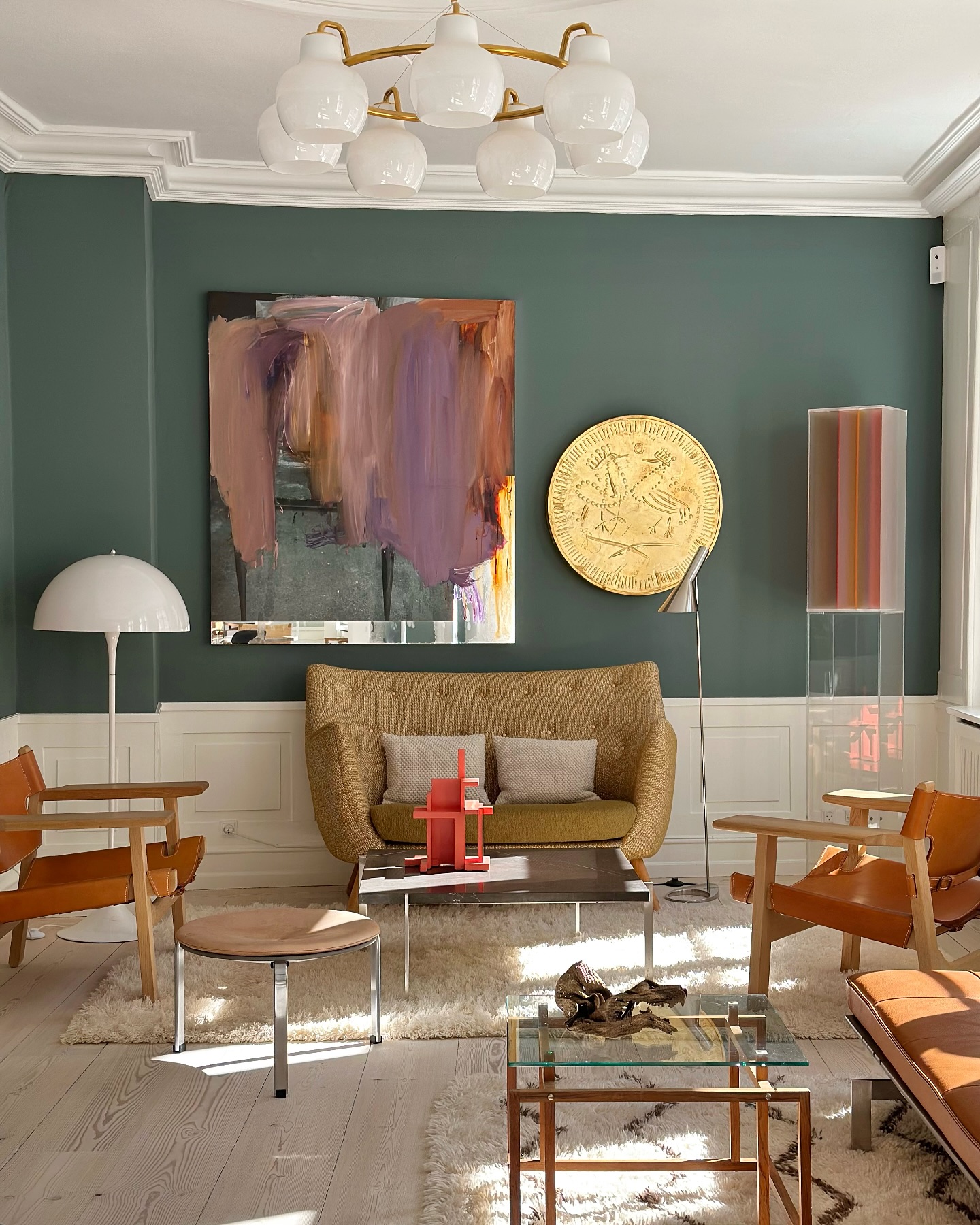 14. Hang Contemporary Art Above Traditional Wainscoting
