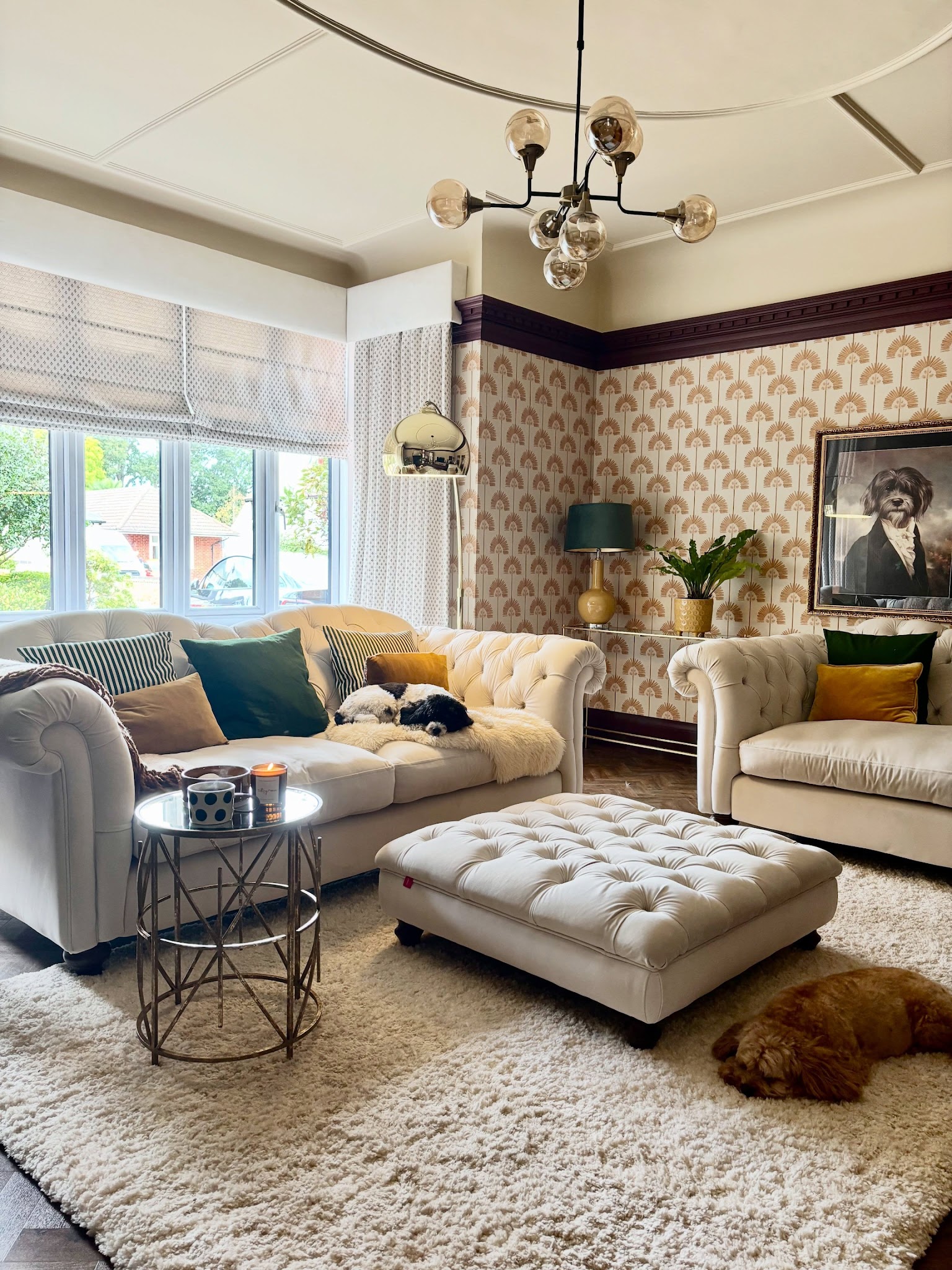 17. Update Buttoned Sofas With Open Globe Lighting