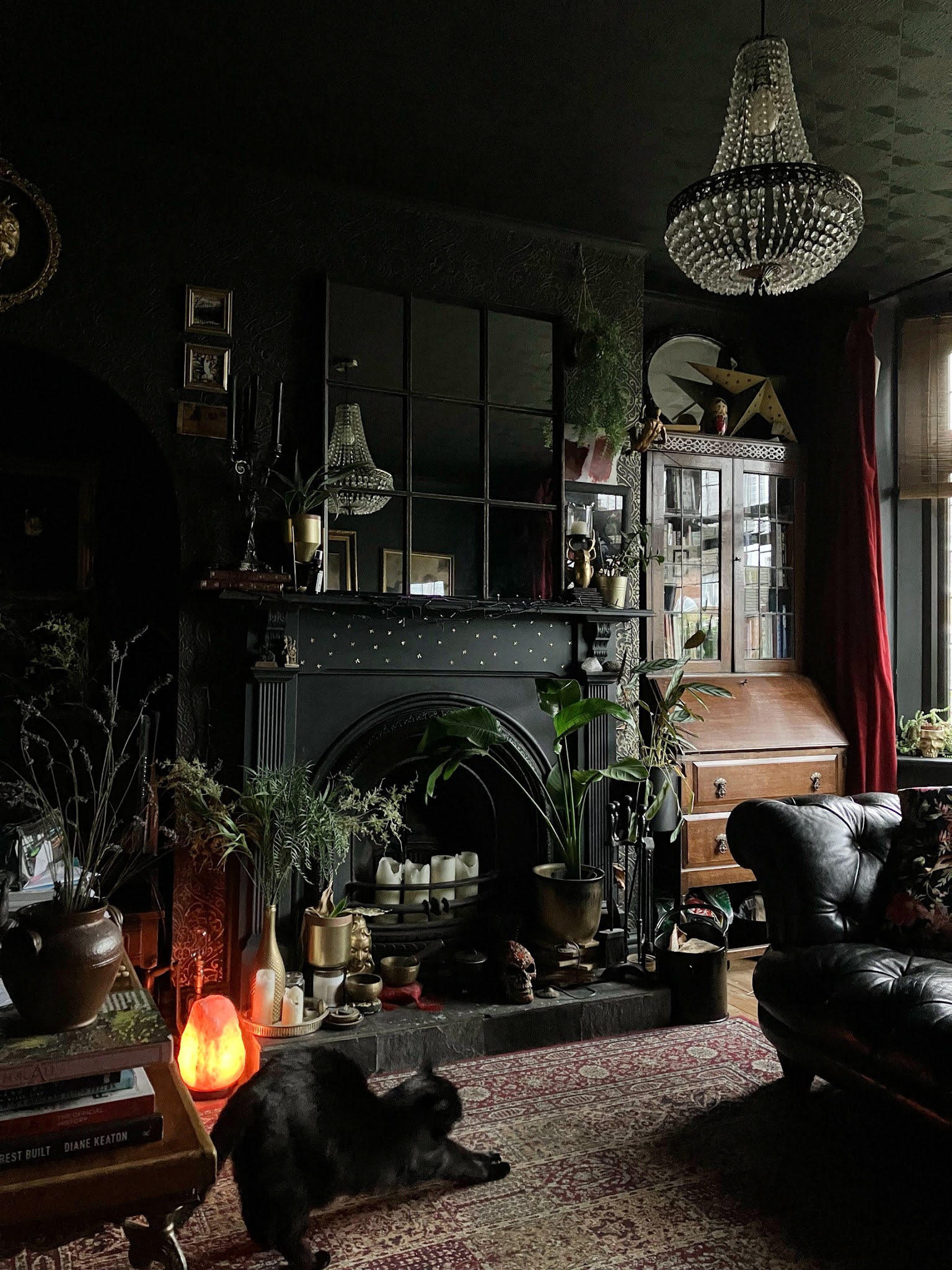 18. Reflect a Dark Fireplace Wall With a Gridded Mirror