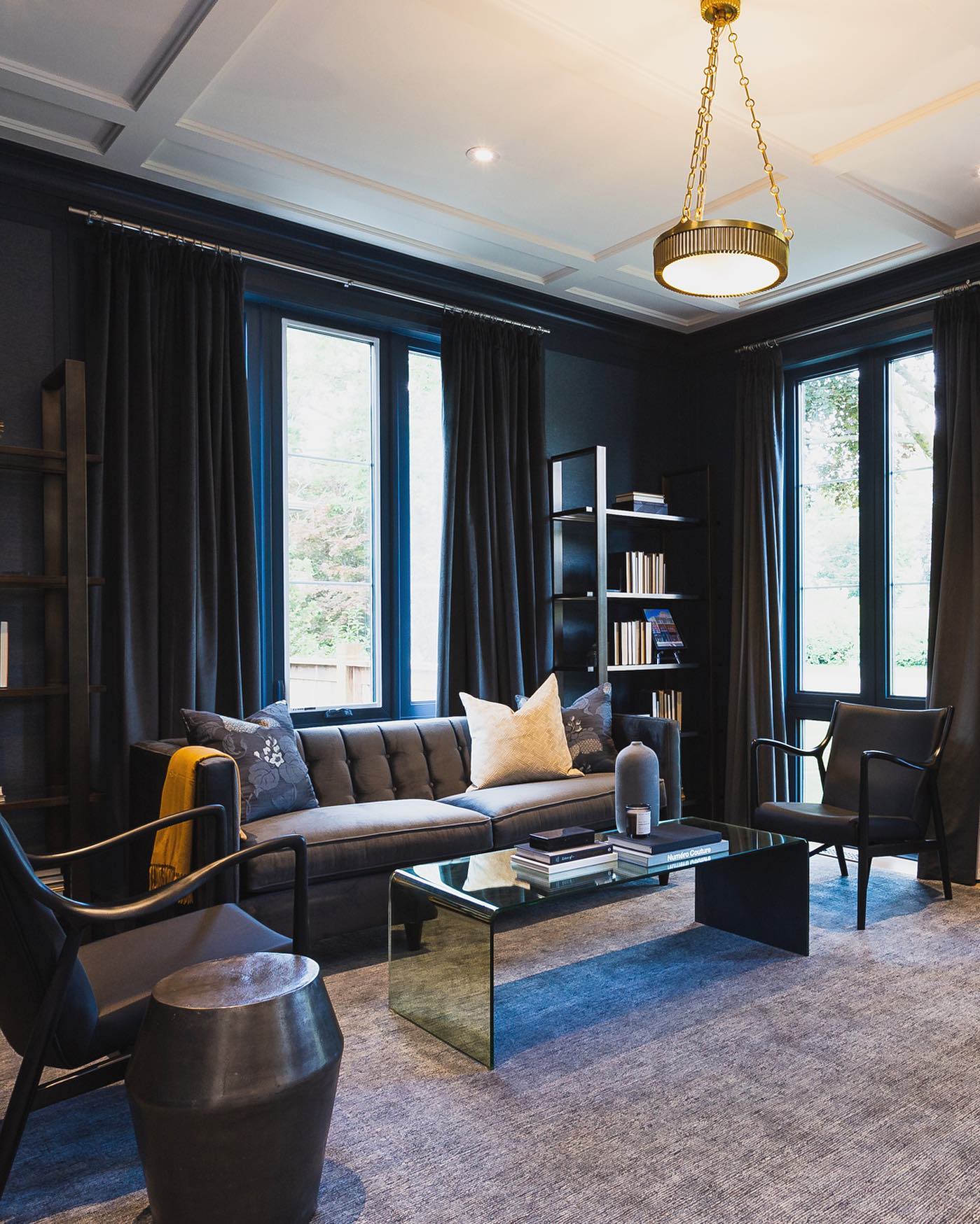 13. Blend Dark Curtains With the Window Wall