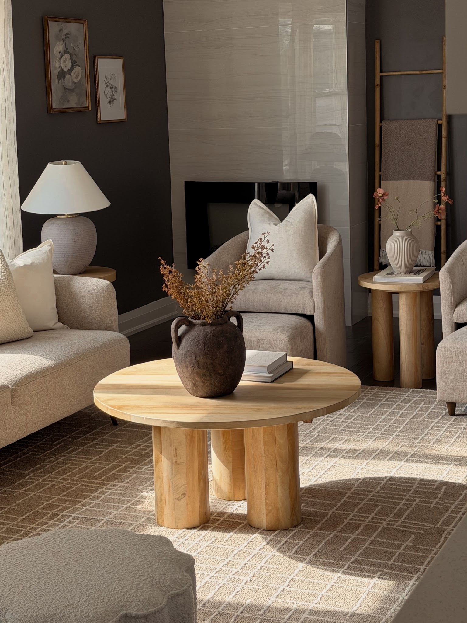 3. Frame a Light Fireplace With Charcoal Walls