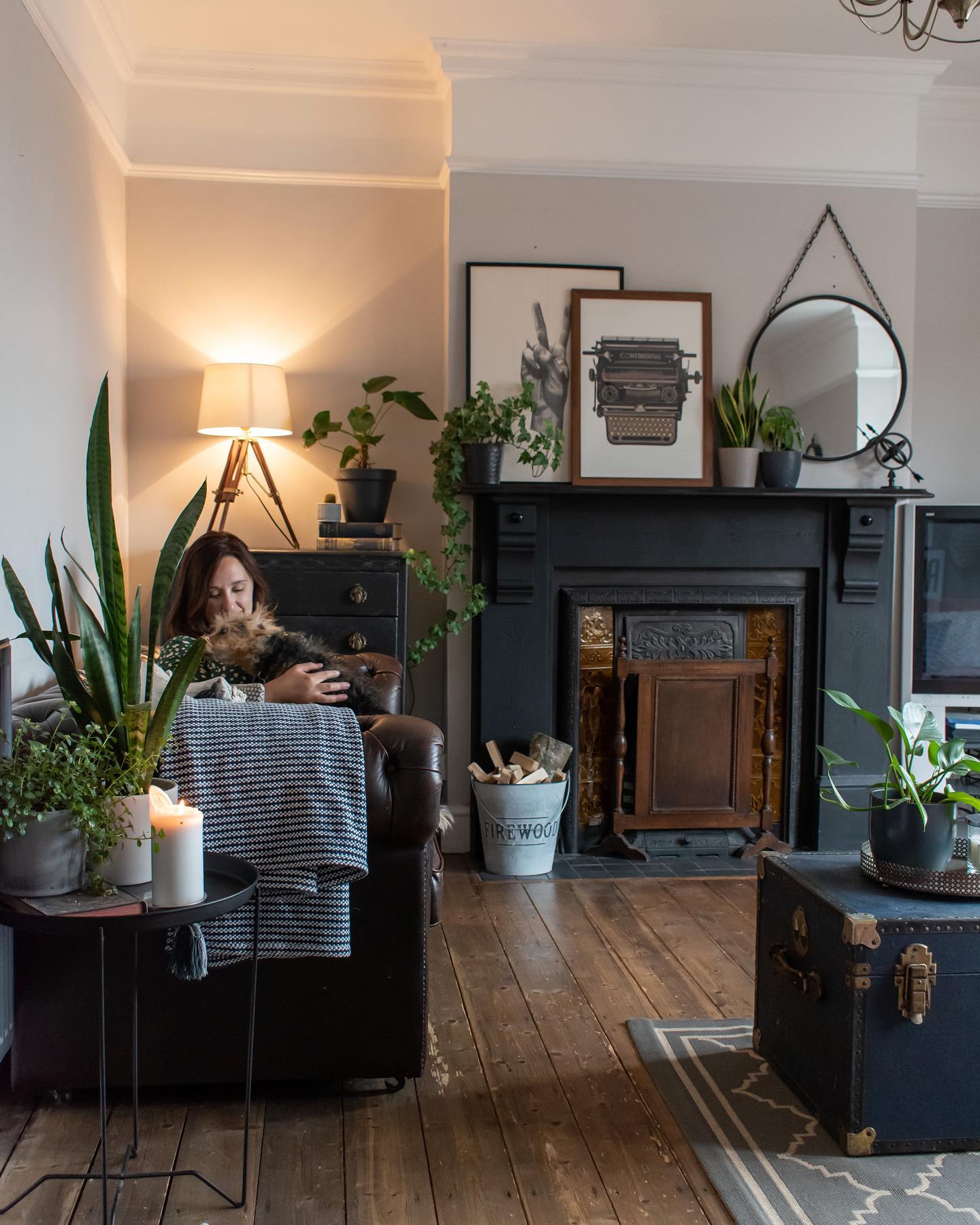 9. Layer Dark Vintage Pieces Against Pale Walls
