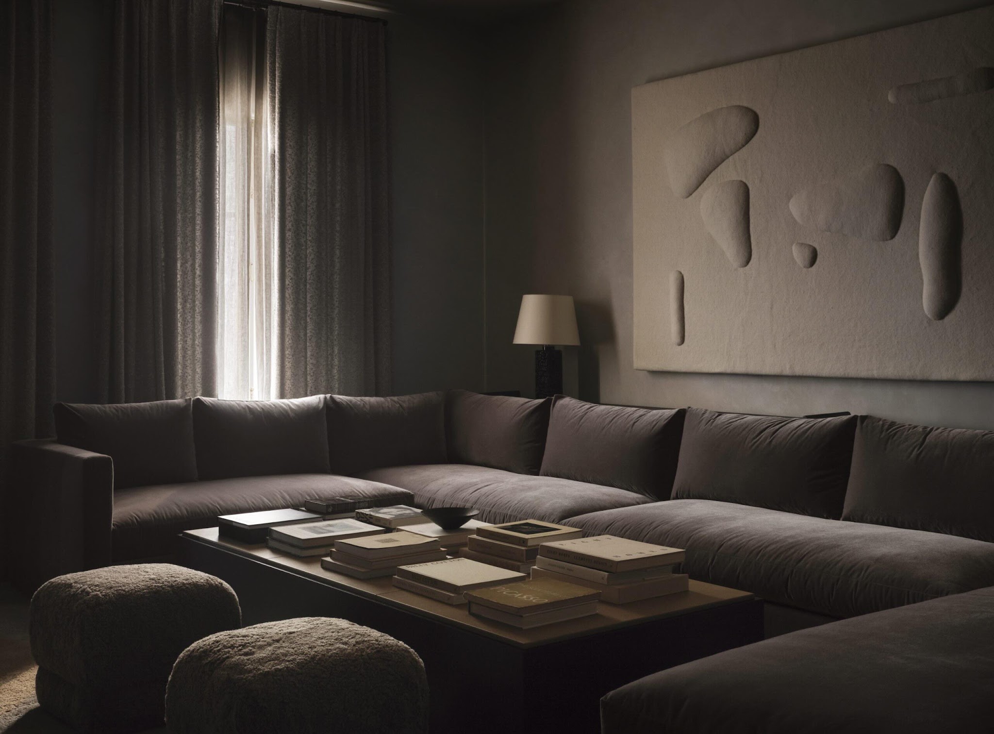 14. Wrap a Deep Sectional in Charcoal Layers